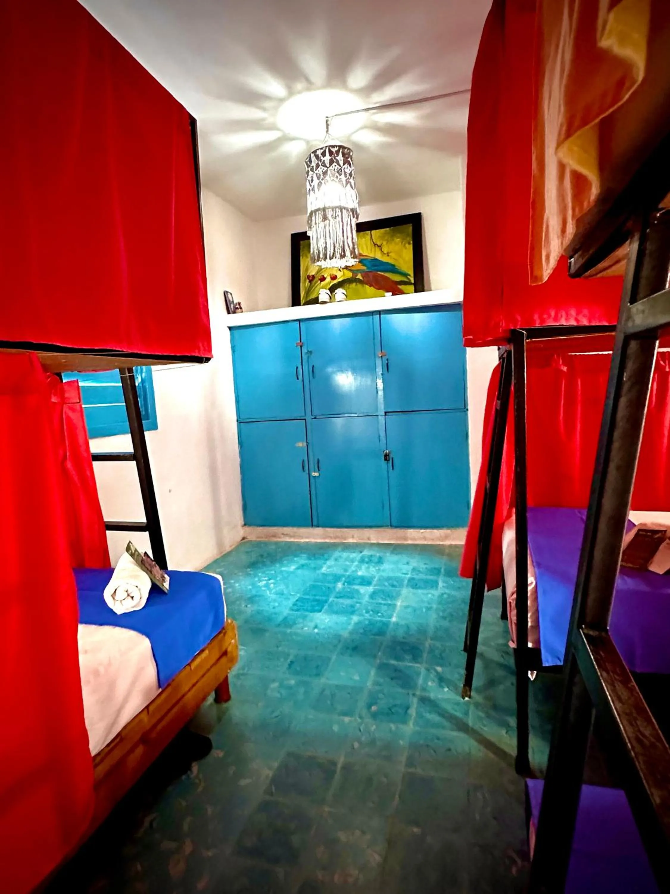 Bed in Guacamayas Hostel and Social Laundry