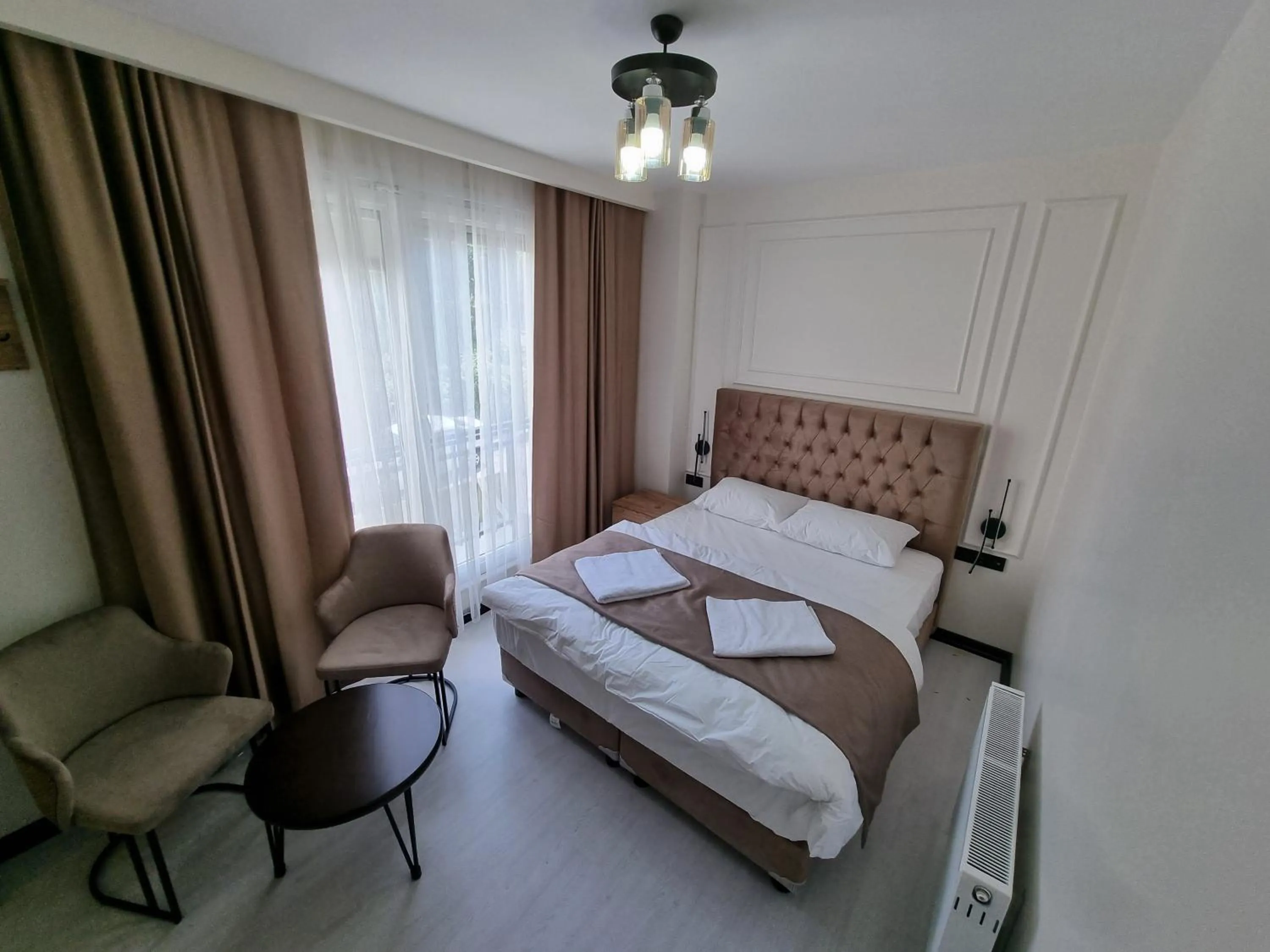 Bed in Elite Park Hotel & Suites