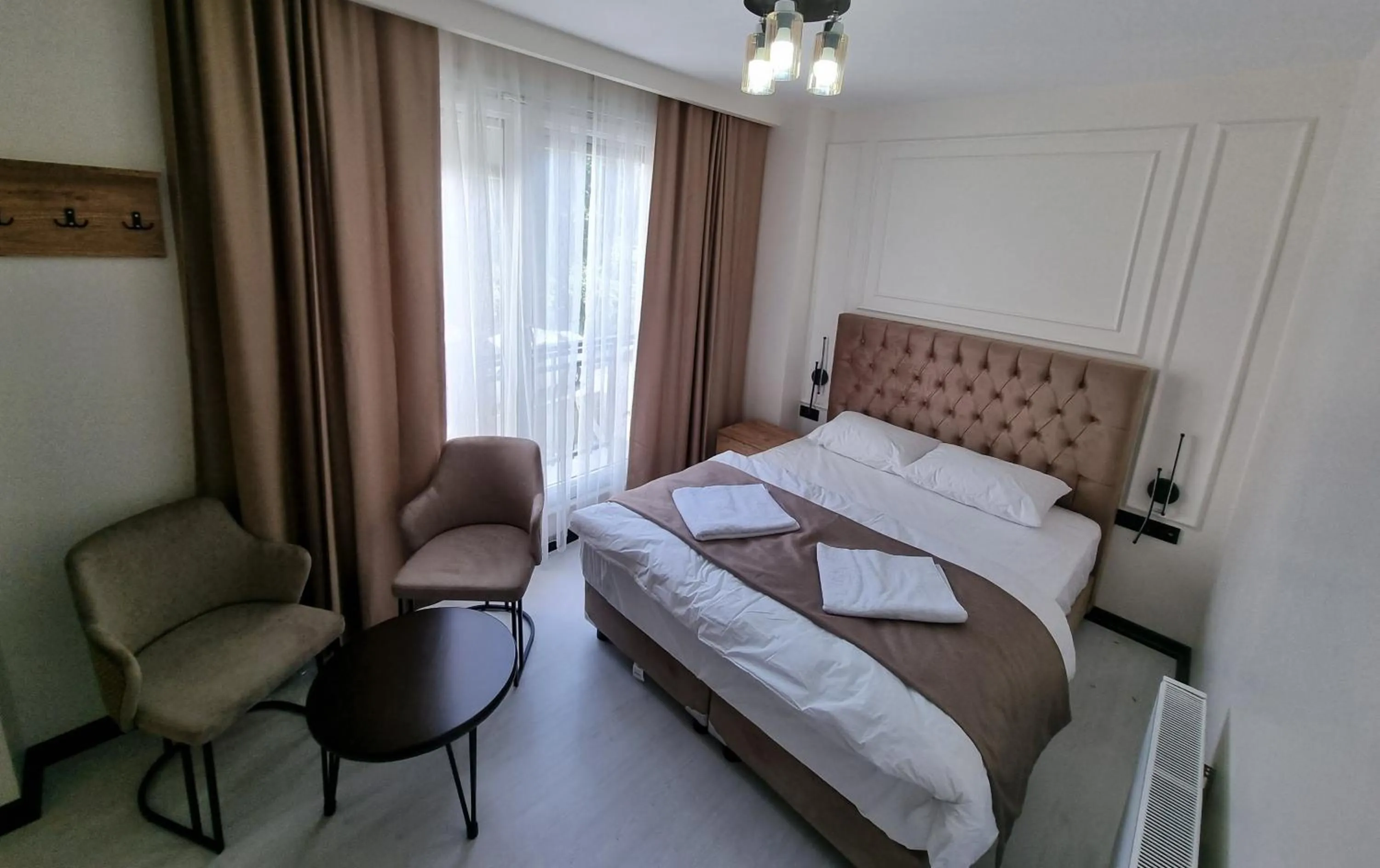 Bed in Elite Park Hotel & Suites