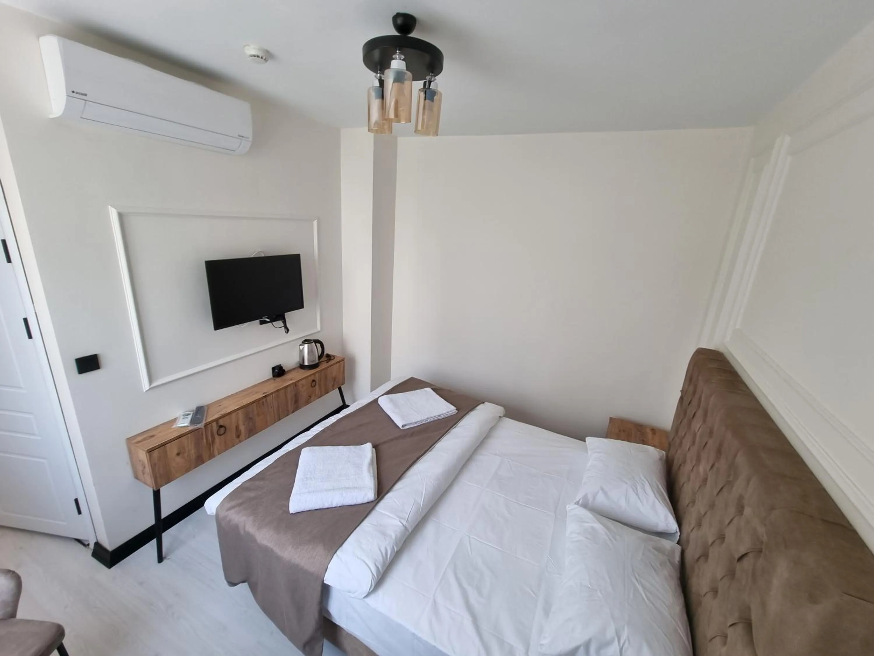 Bed in Elite Park Hotel & Suites