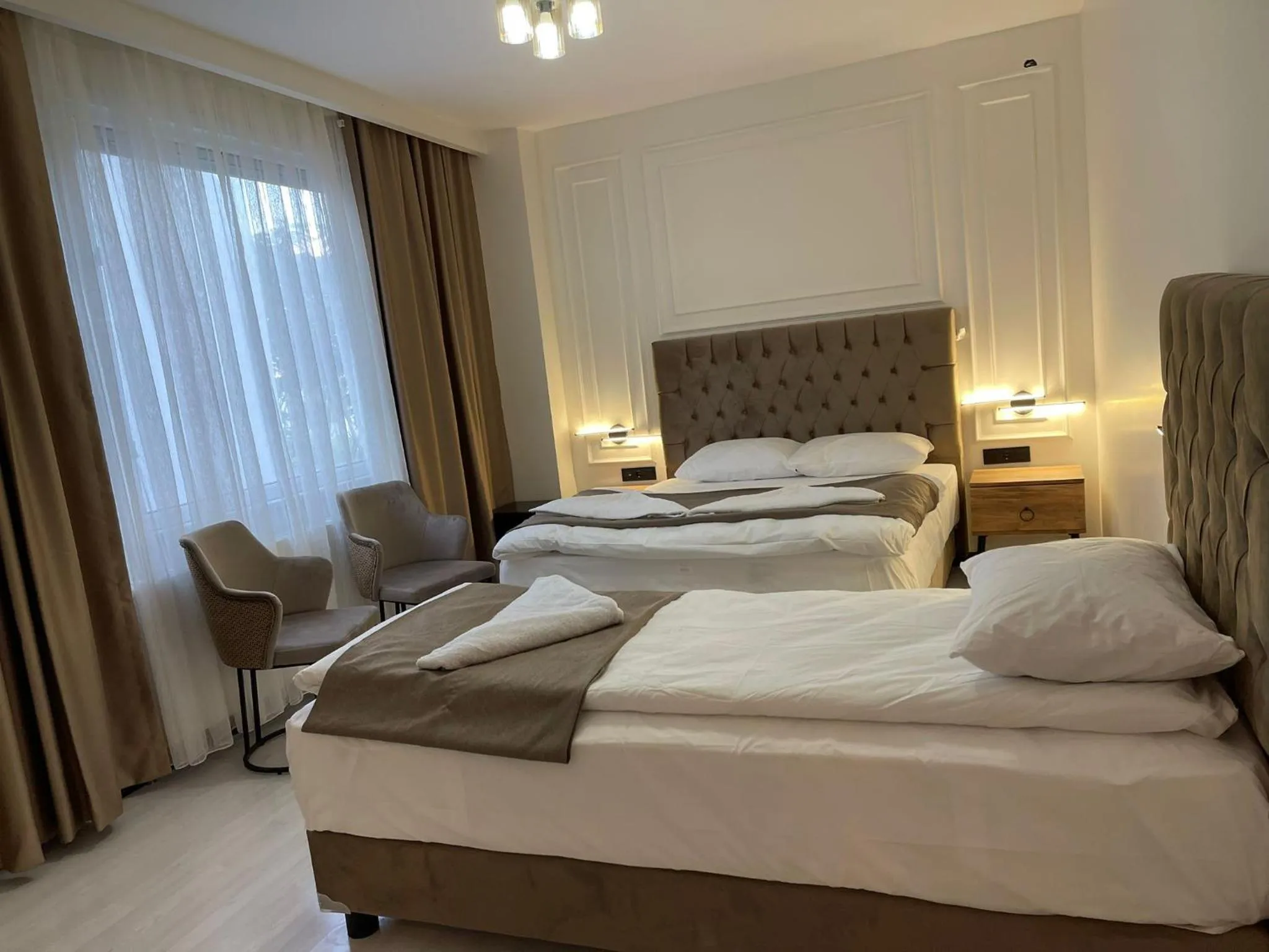 Bed in Elite Park Hotel & Suites