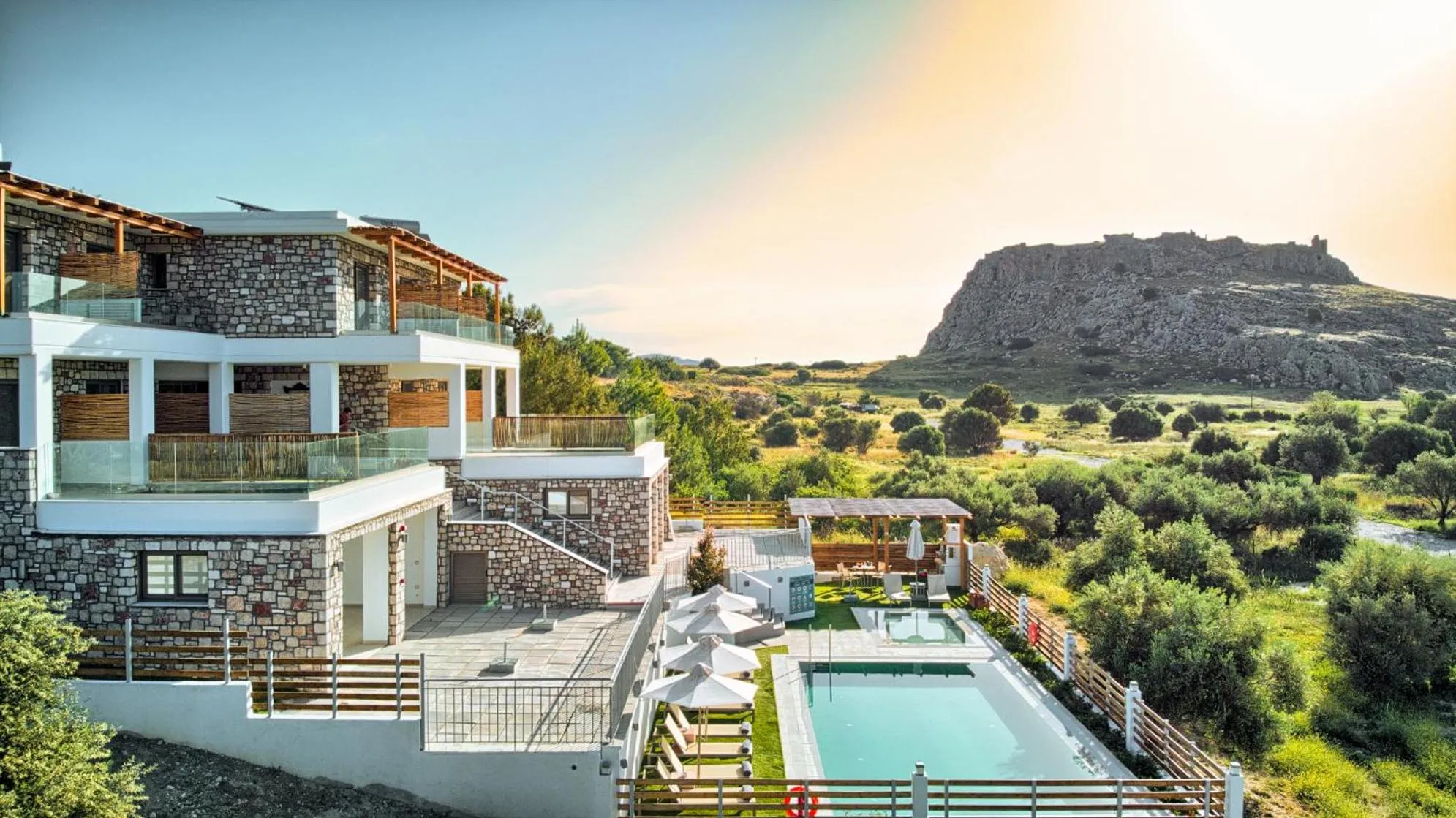 Property building in KOUROS STONE SUITES