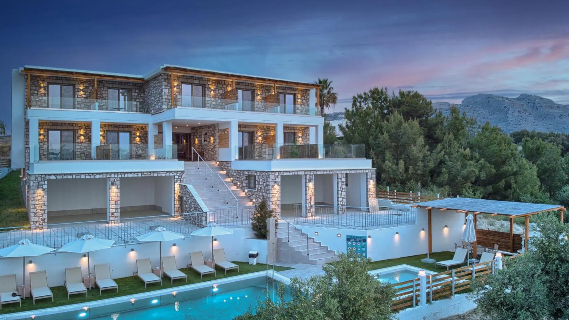 Property building in KOUROS STONE SUITES