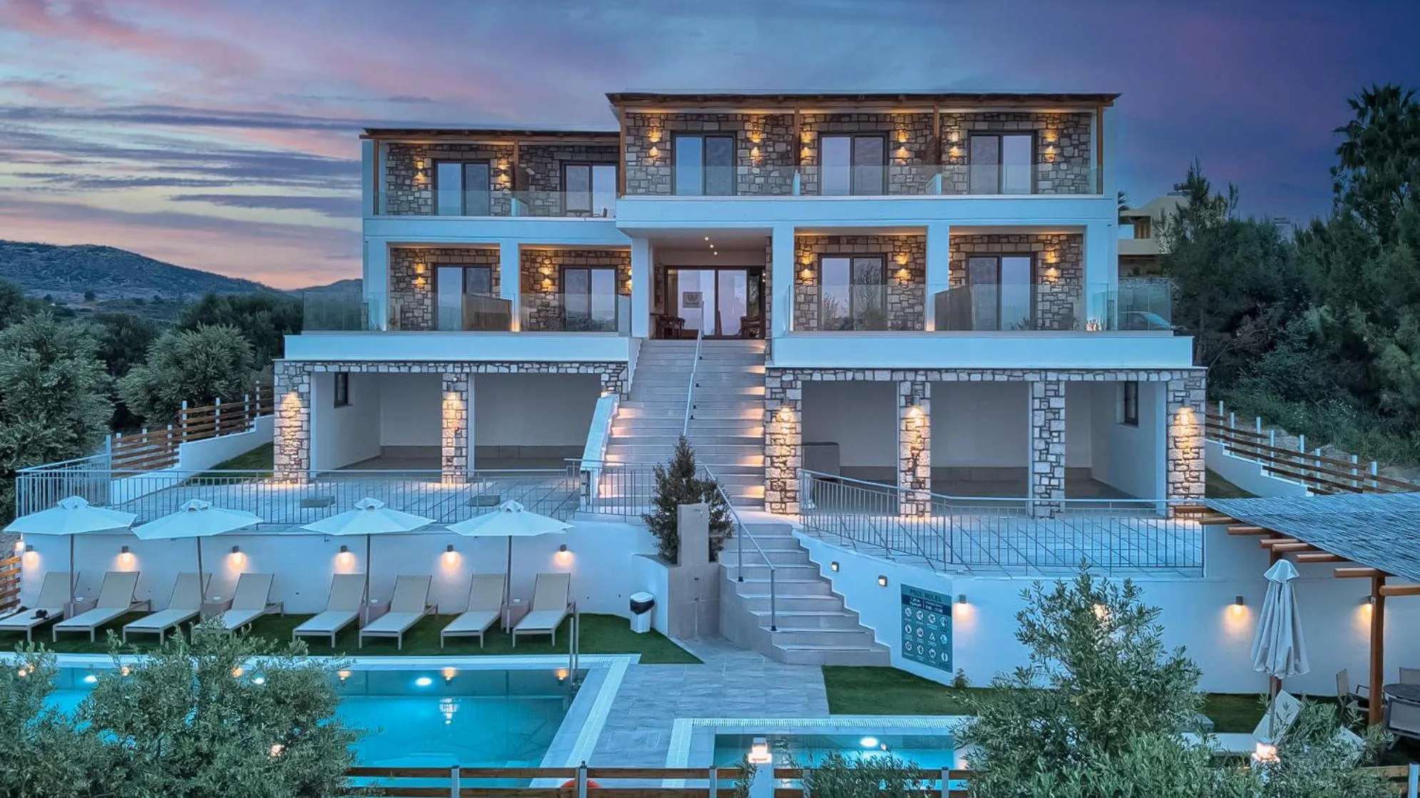 Property building in KOUROS STONE SUITES