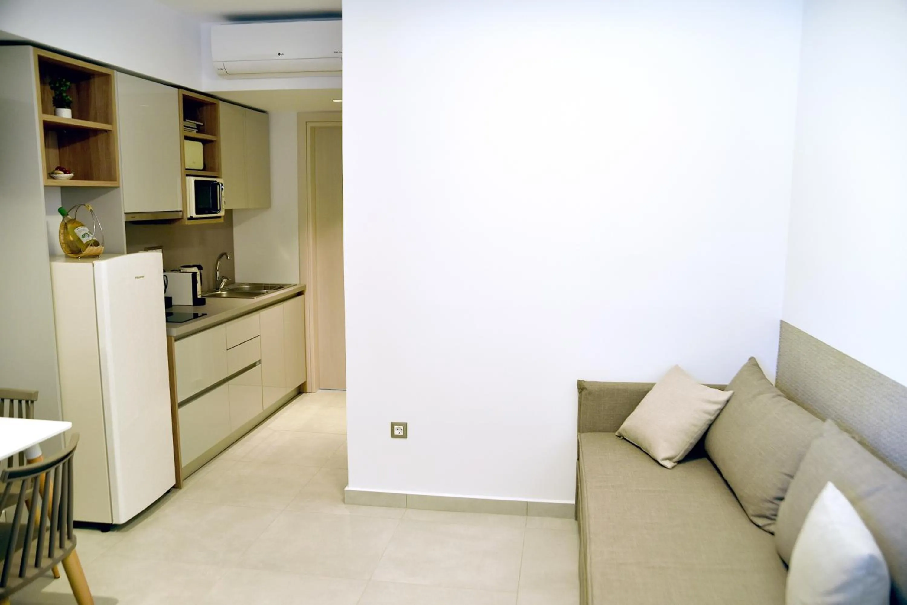 Kitchen or kitchenette in KOUROS STONE SUITES