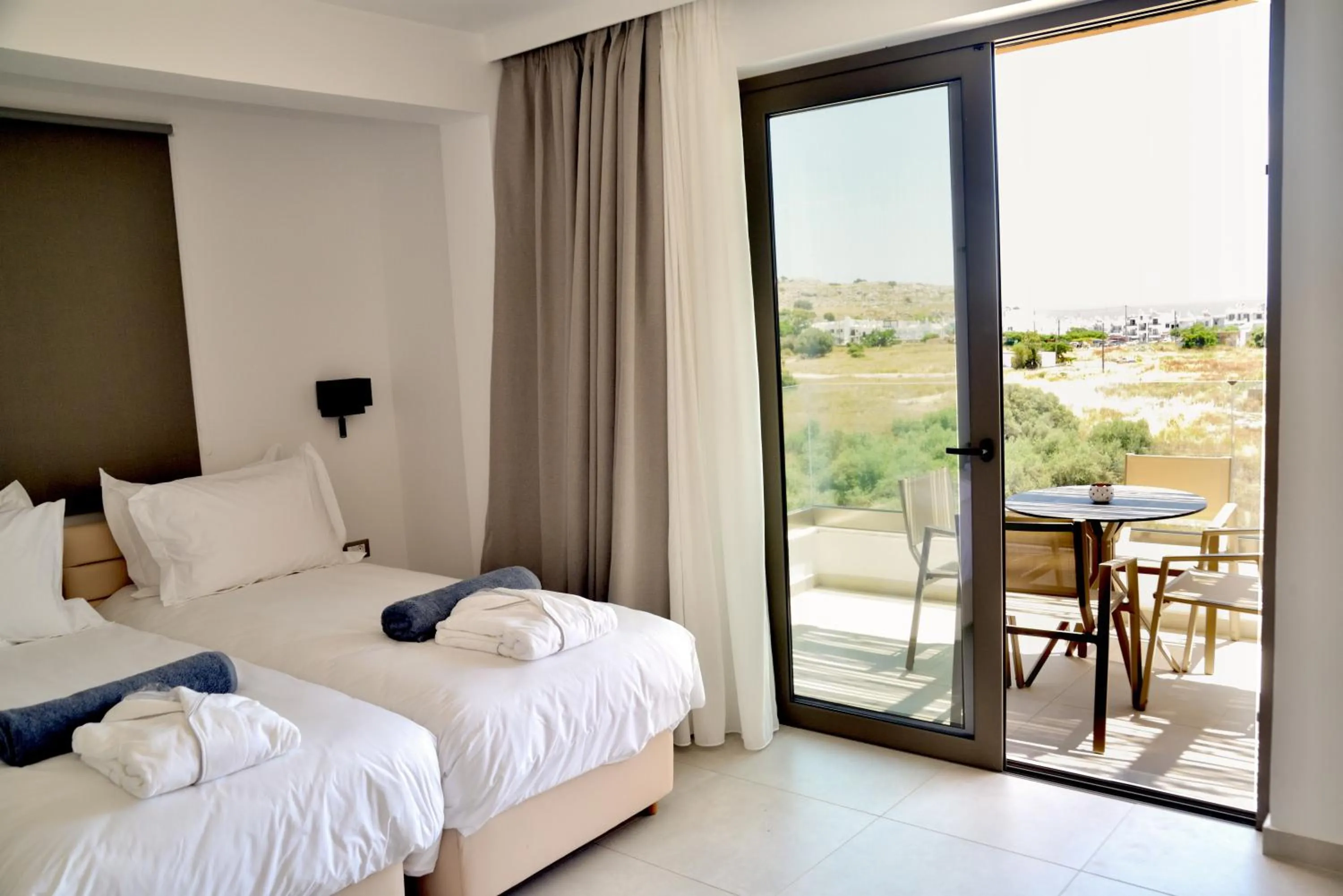 Bed in KOUROS STONE SUITES