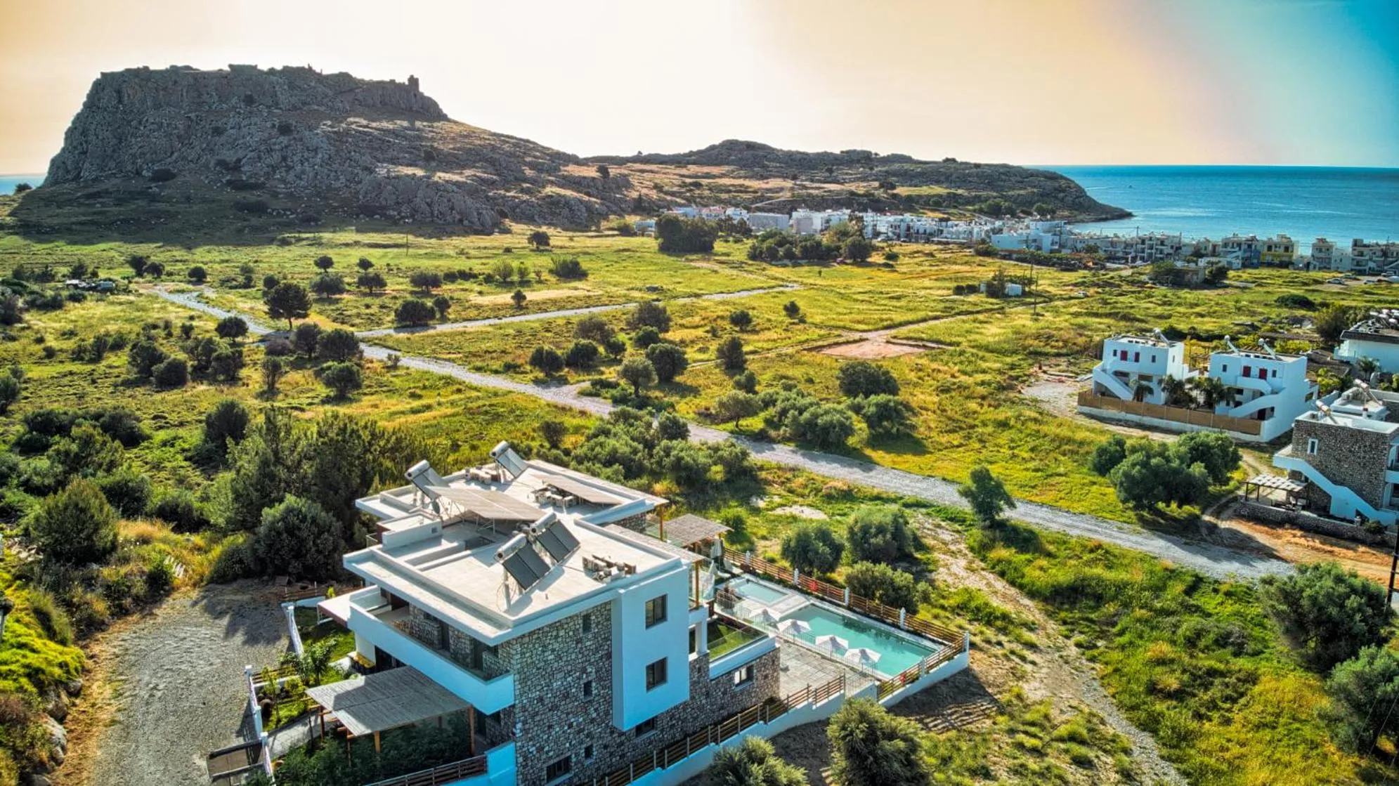 Property building in KOUROS STONE SUITES