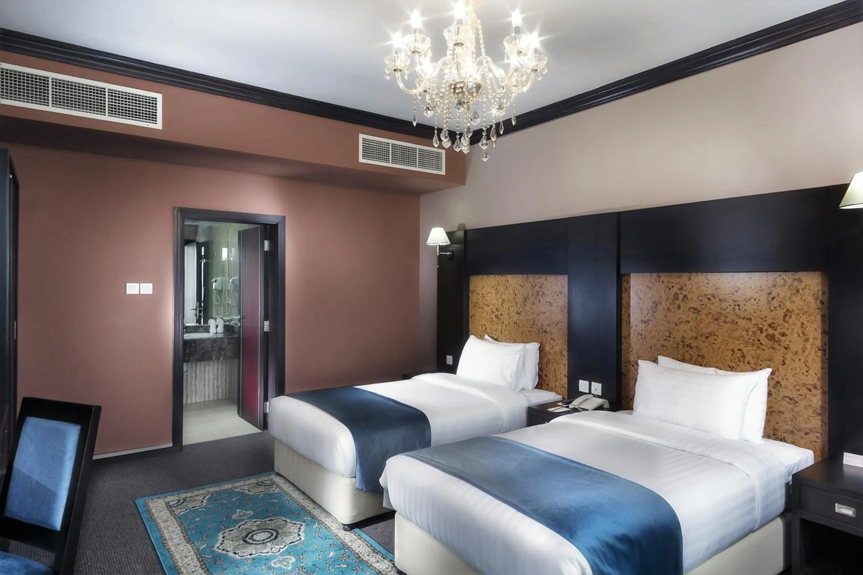 Bedroom in Royal Phoenicia Hotel