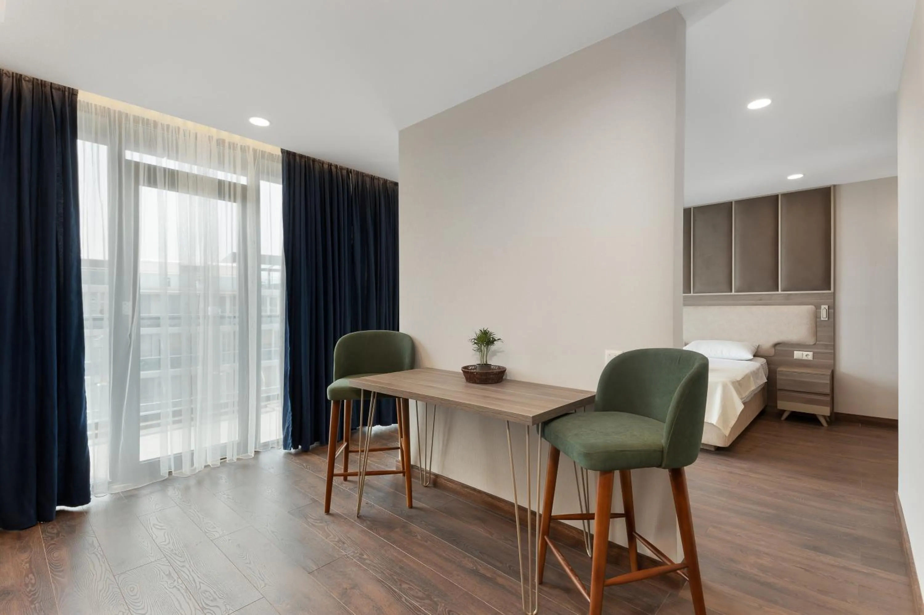 Dining area, Bed in Wyn Residence Batumi