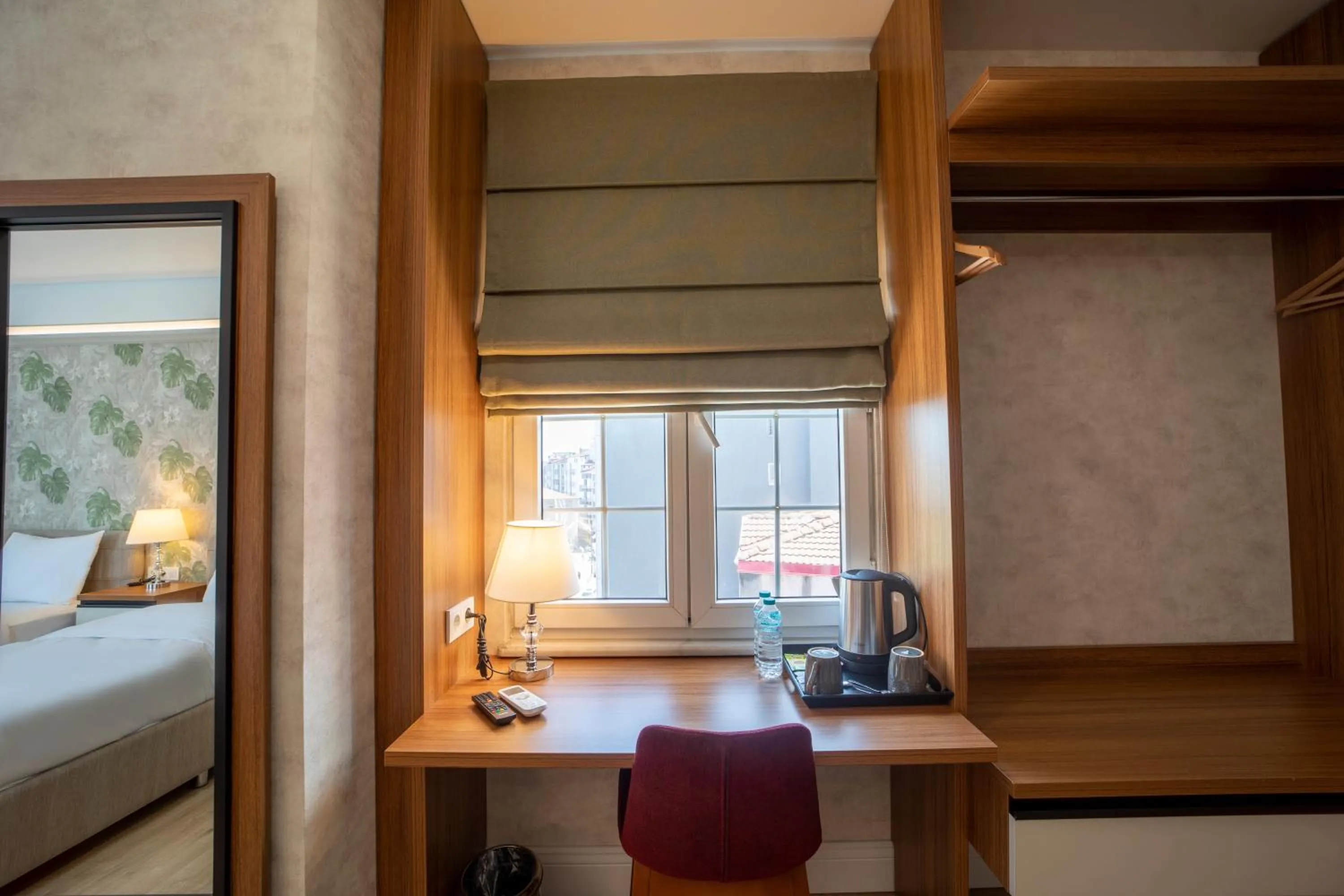 Bed in MELL City Suites Hotel