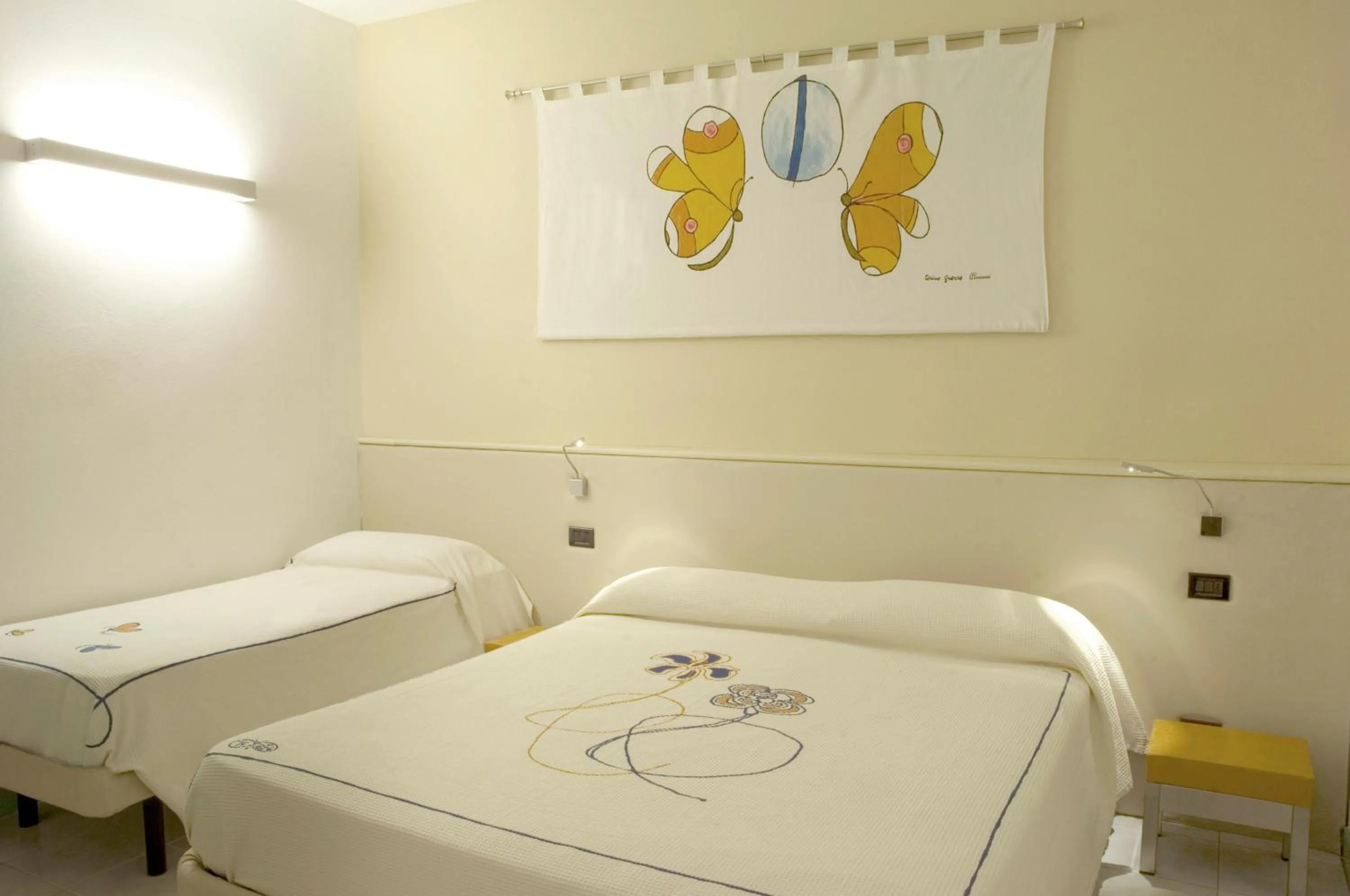 Bed in Hotel Eros Residence