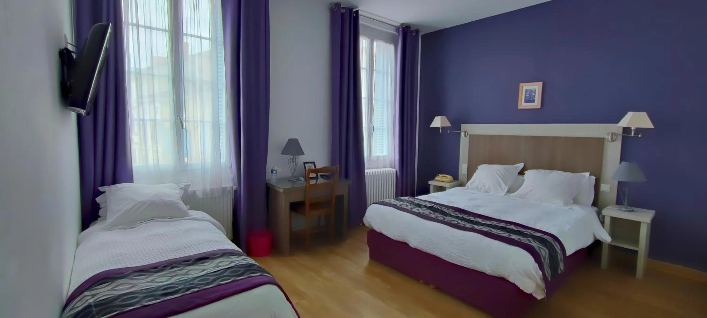 Photo of the whole room, Bed in Logis Grand Hotel Pelisson