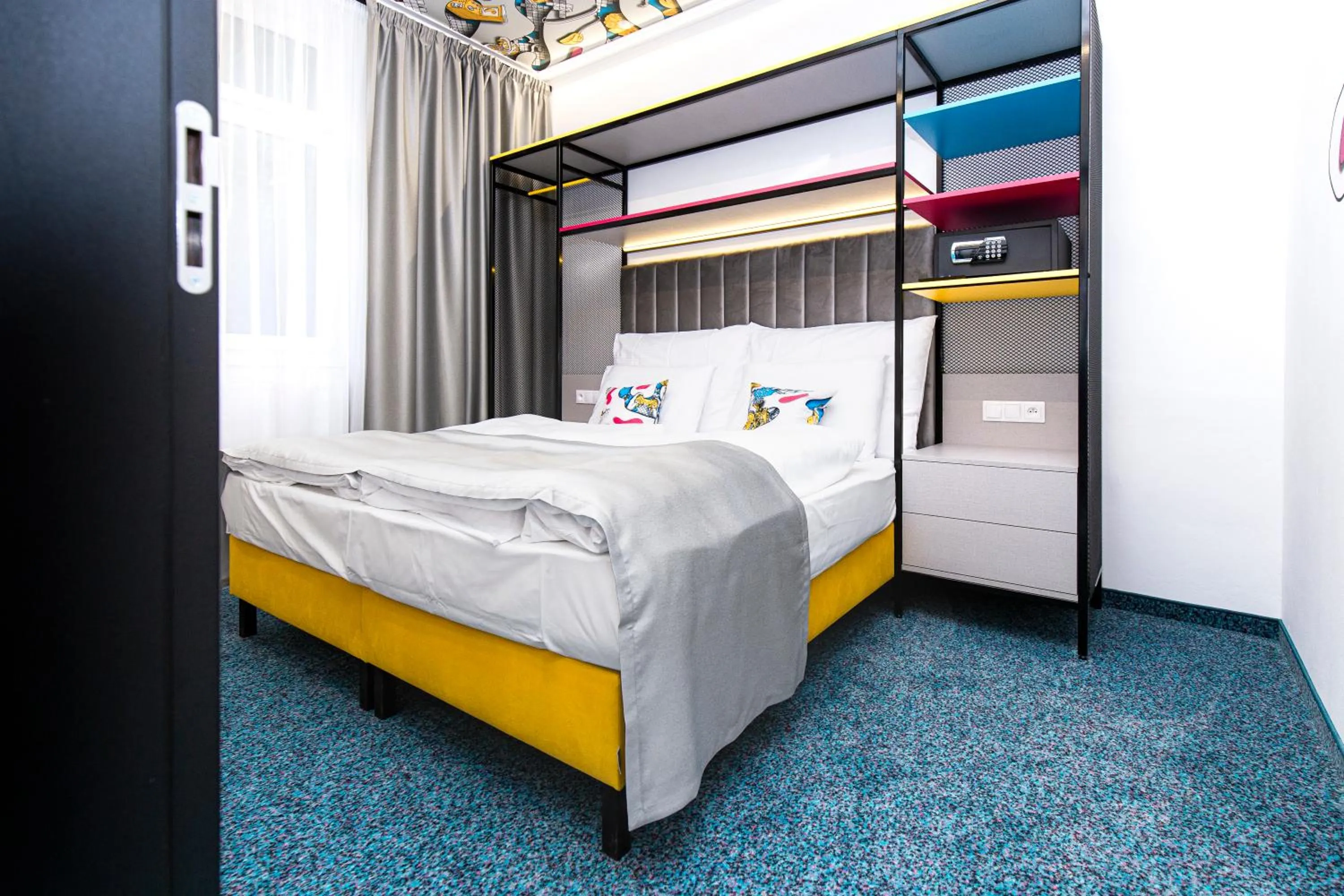 Bed in Family Apartments by ASTORIA Hotel & Medical Spa