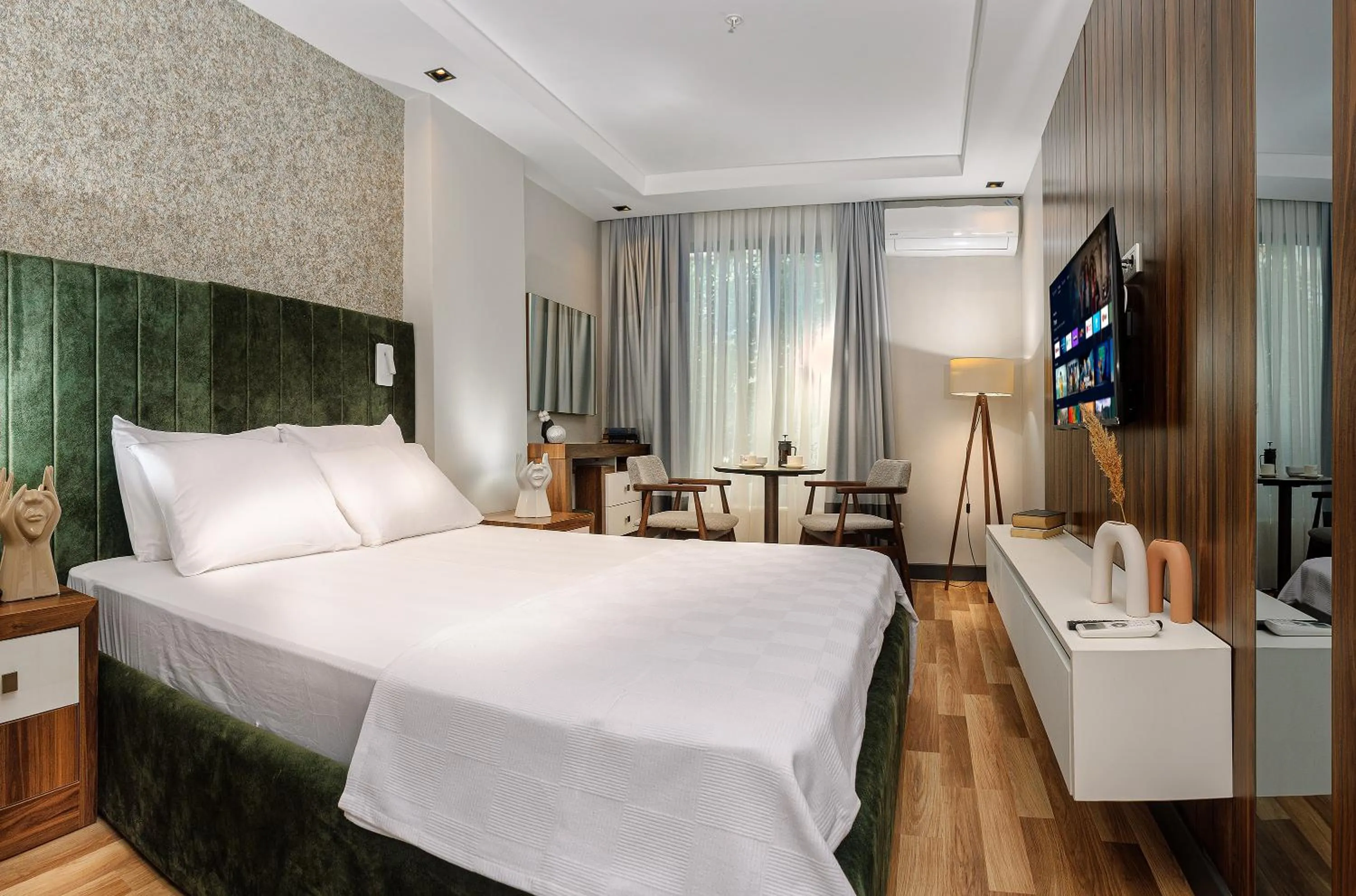 Bed in La Mia Suites