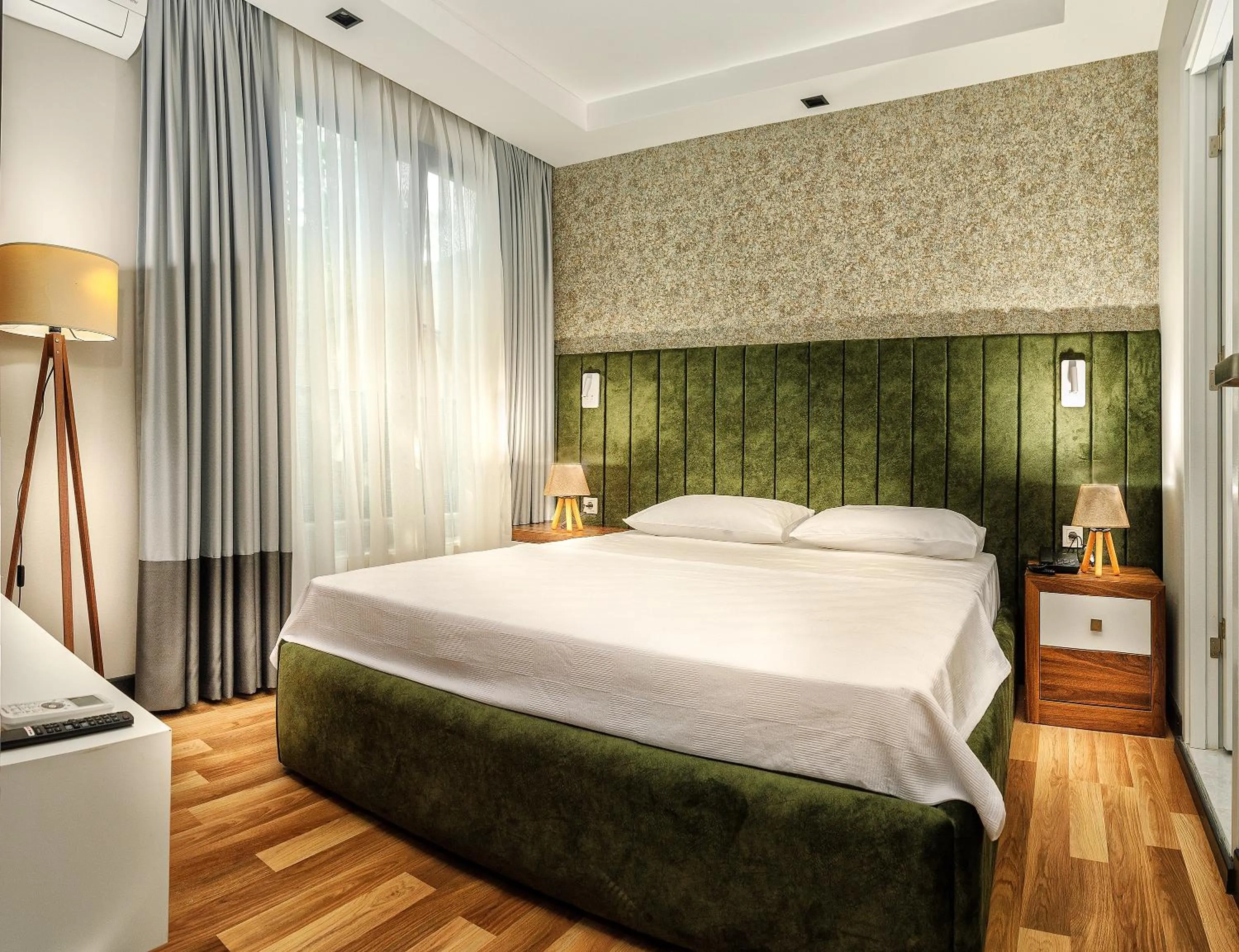 Bed in La Mia Suites