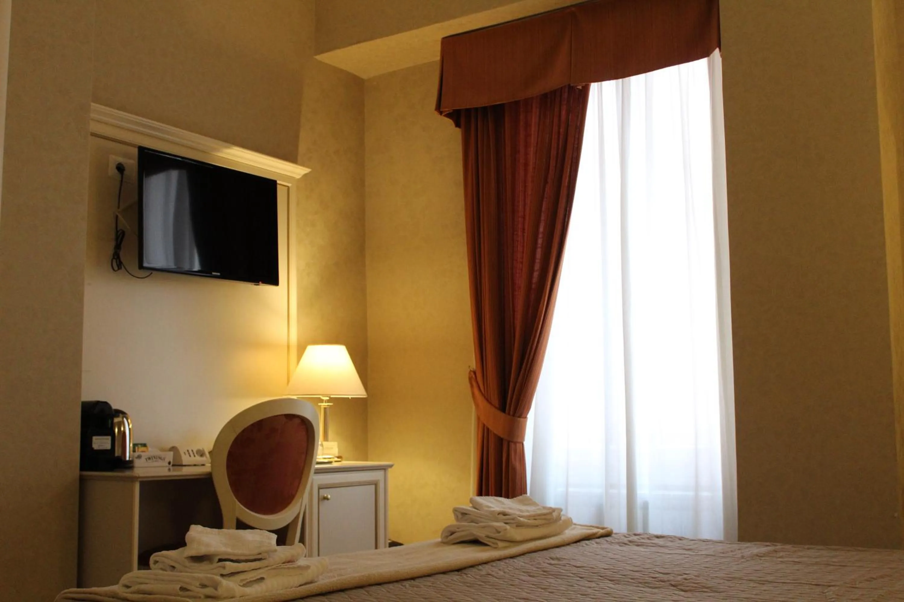 Photo of the whole room, Bed in Relais Bocca di Leone