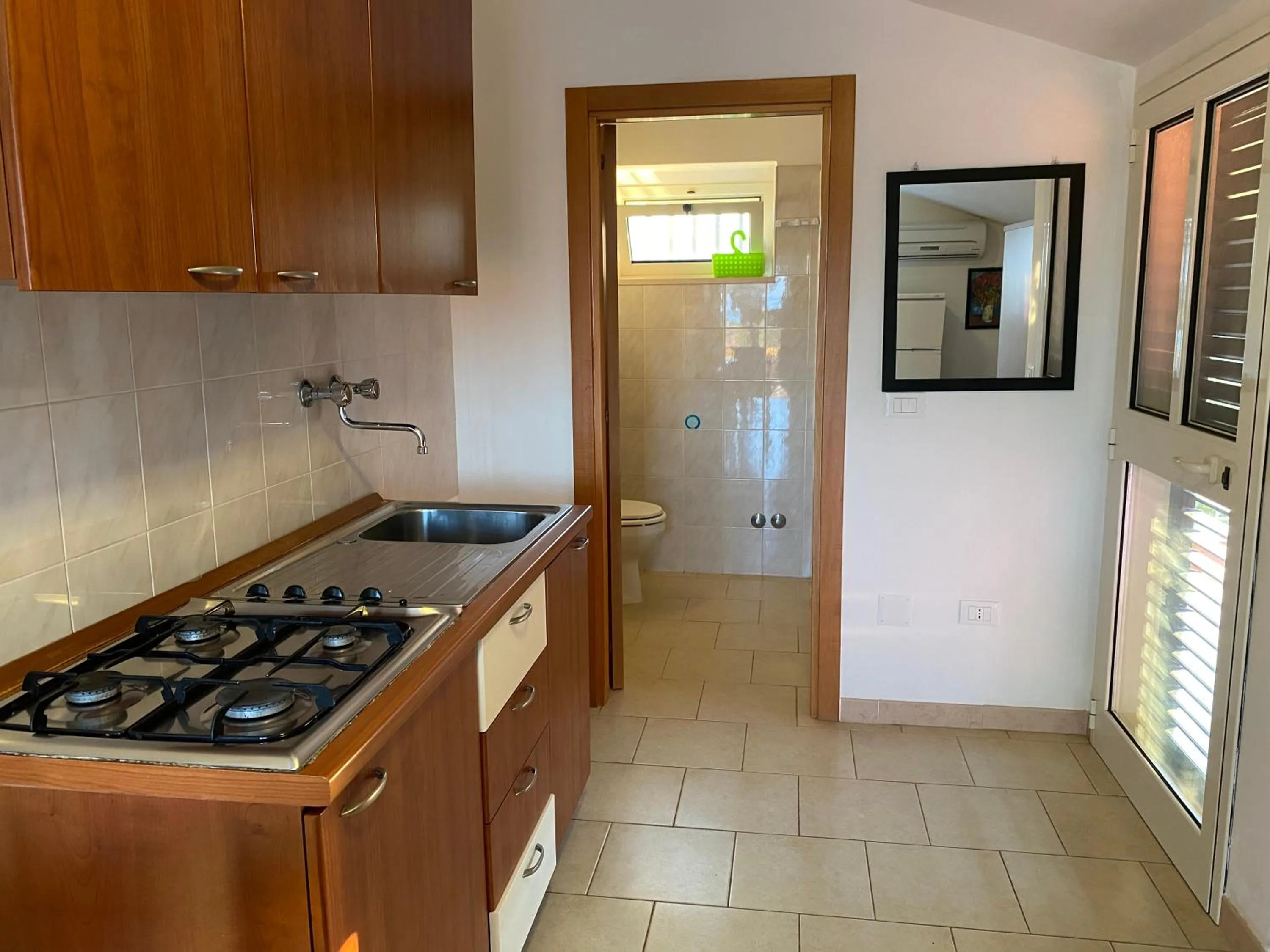 Kitchen or kitchenette in Appartamenti Vacanze Minervino