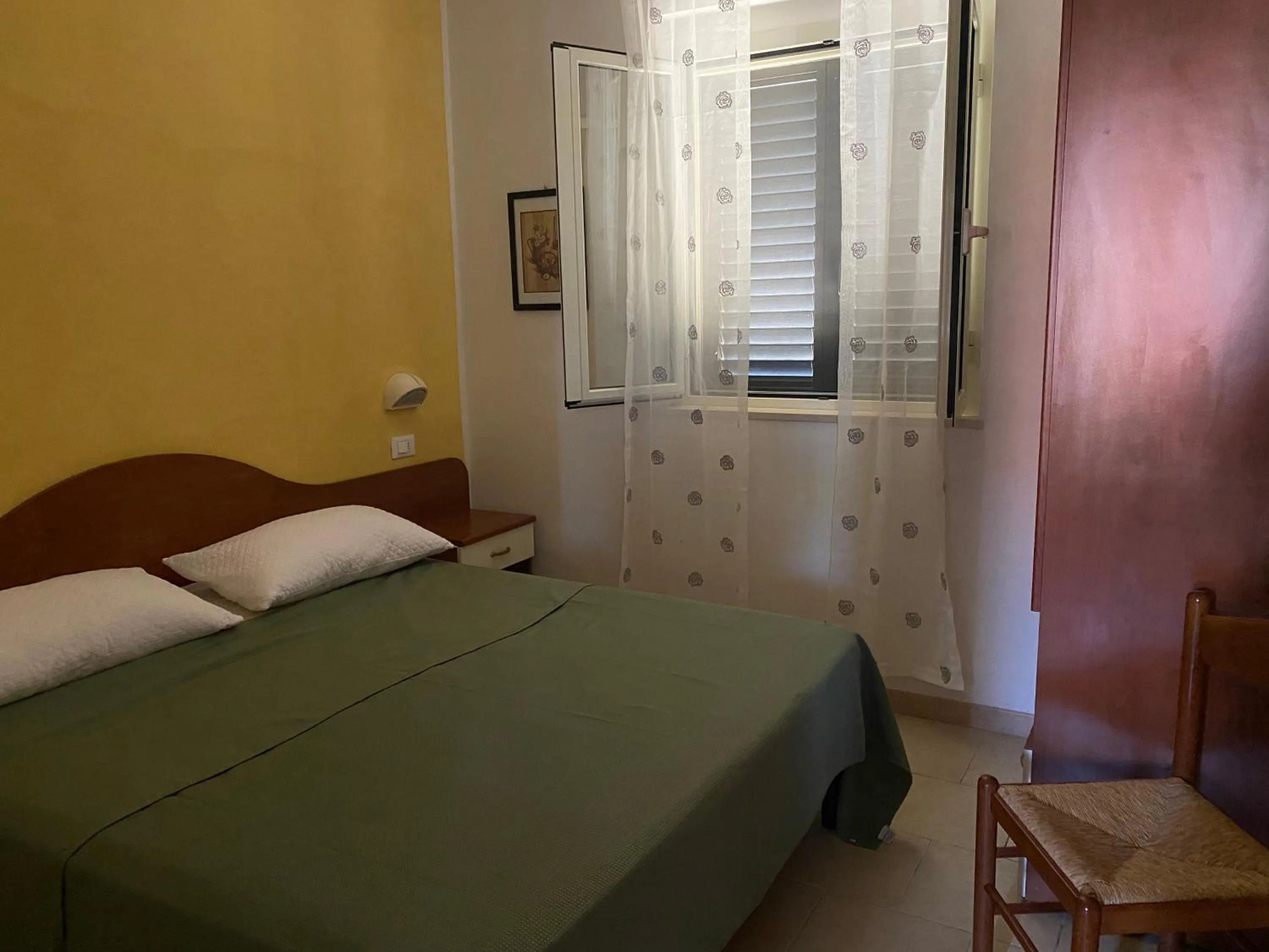 Bed in Appartamenti Vacanze Minervino