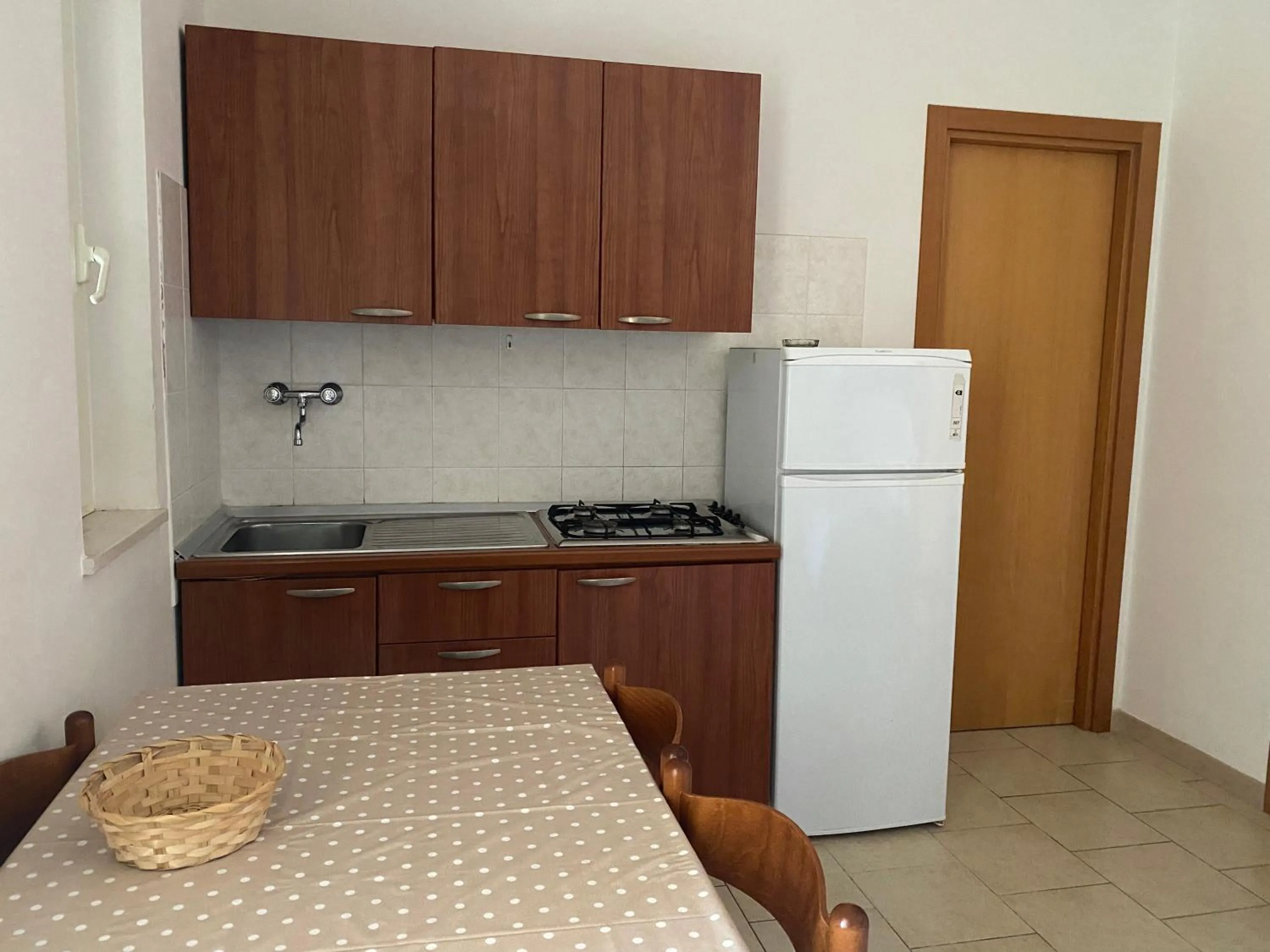 Kitchen or kitchenette in Appartamenti Vacanze Minervino