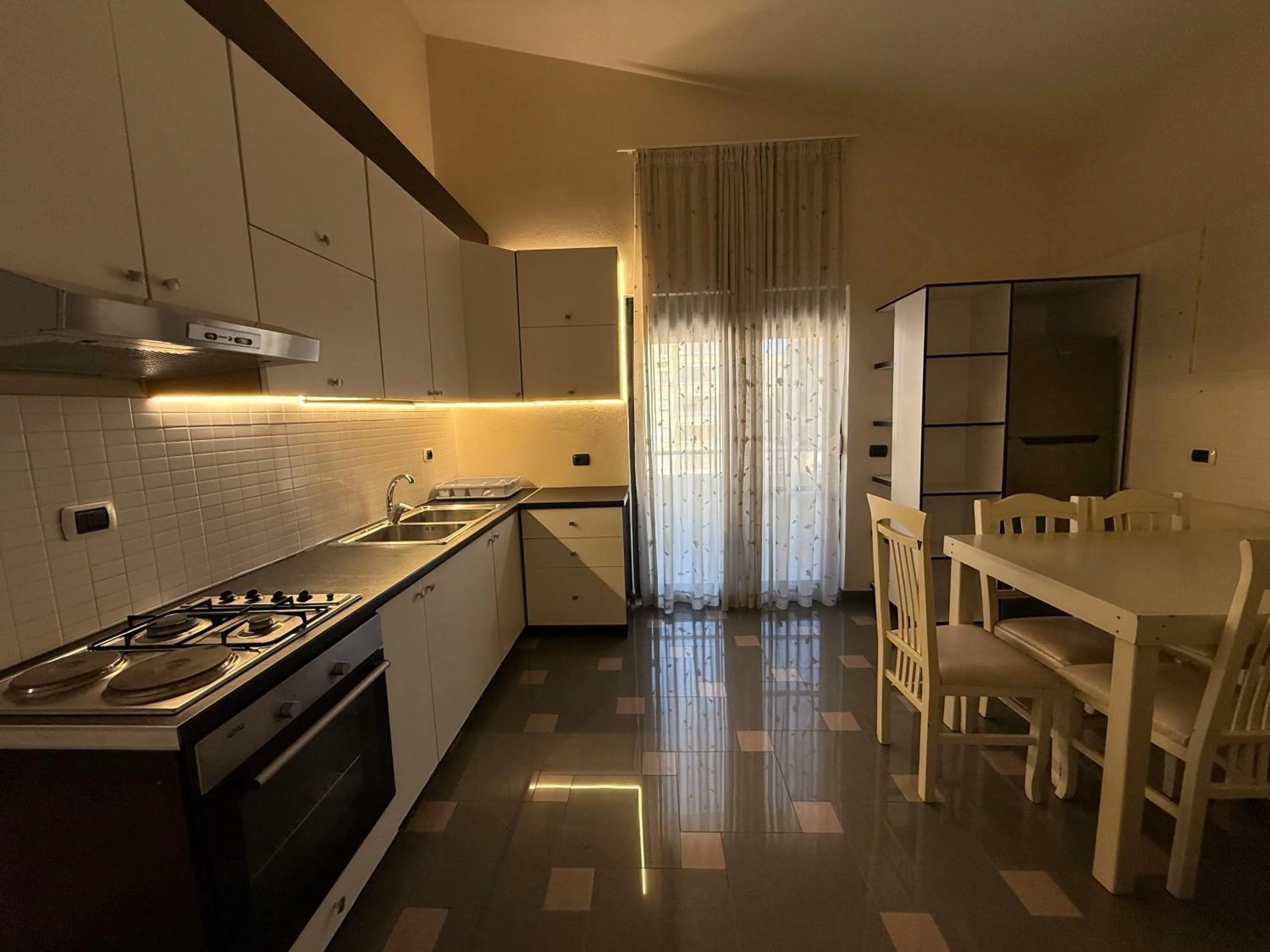 Kitchen or kitchenette in Green Garden Villa