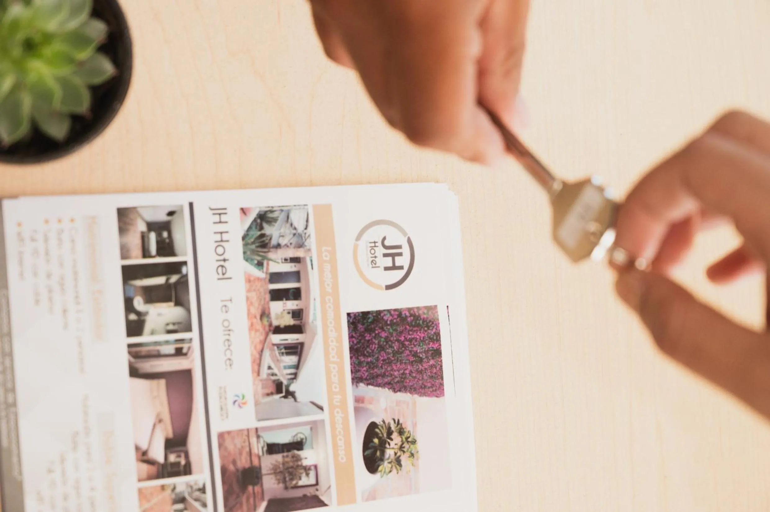 Property logo or sign in JH Hotel Tlatlauqui