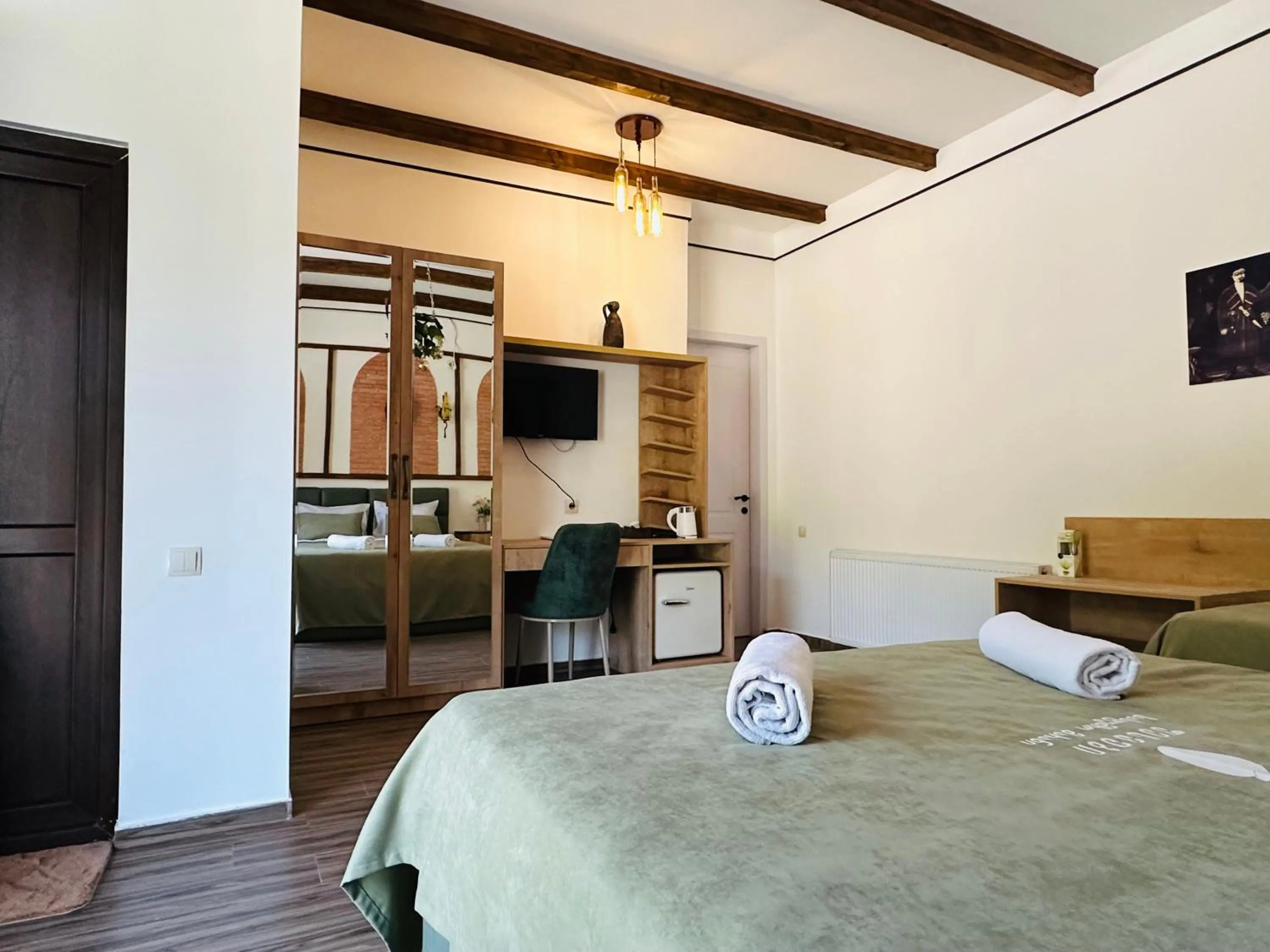 Seating area, Bed in Pesvebi Design Hotel and Cellar