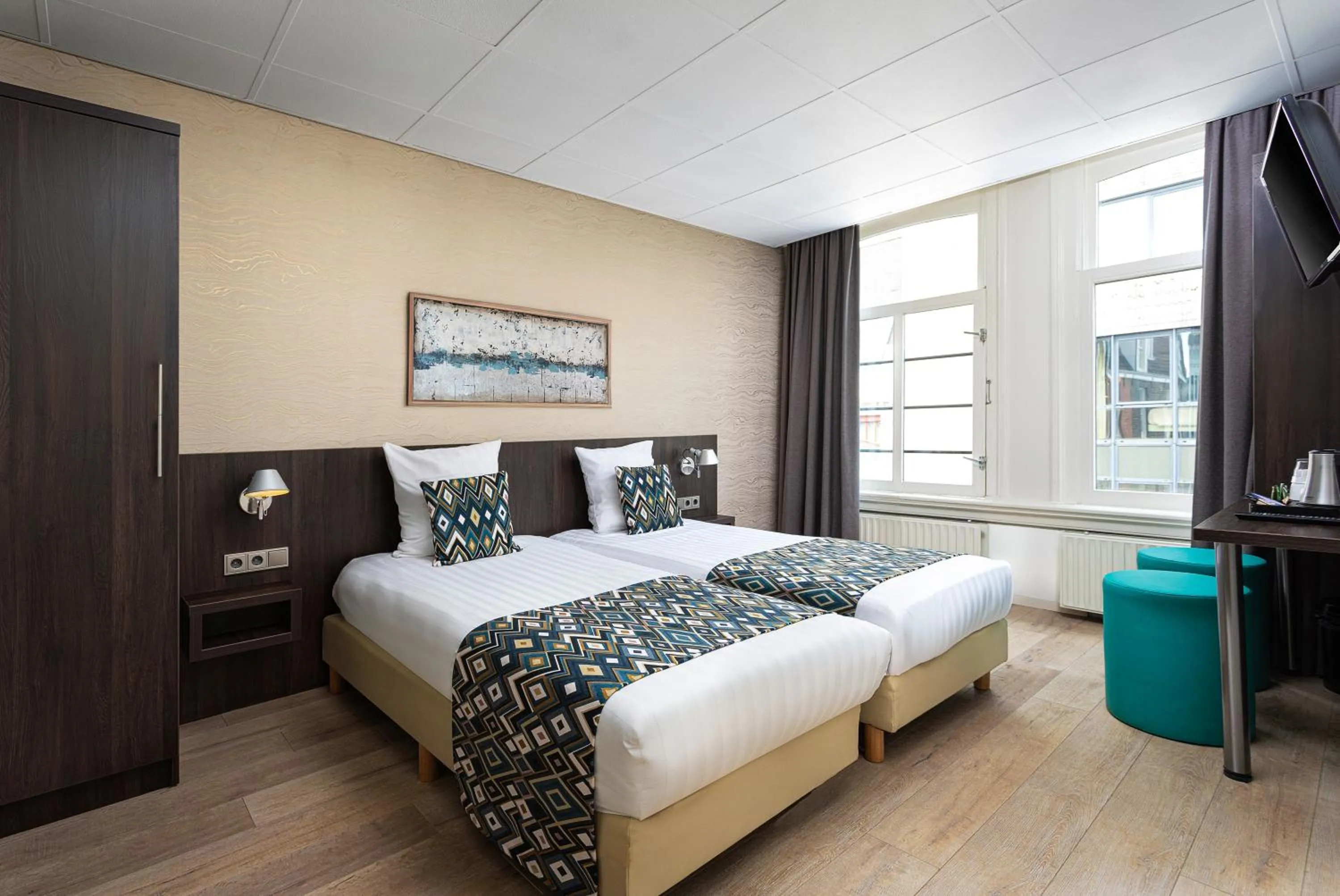 Bed in Hotel Damsquare