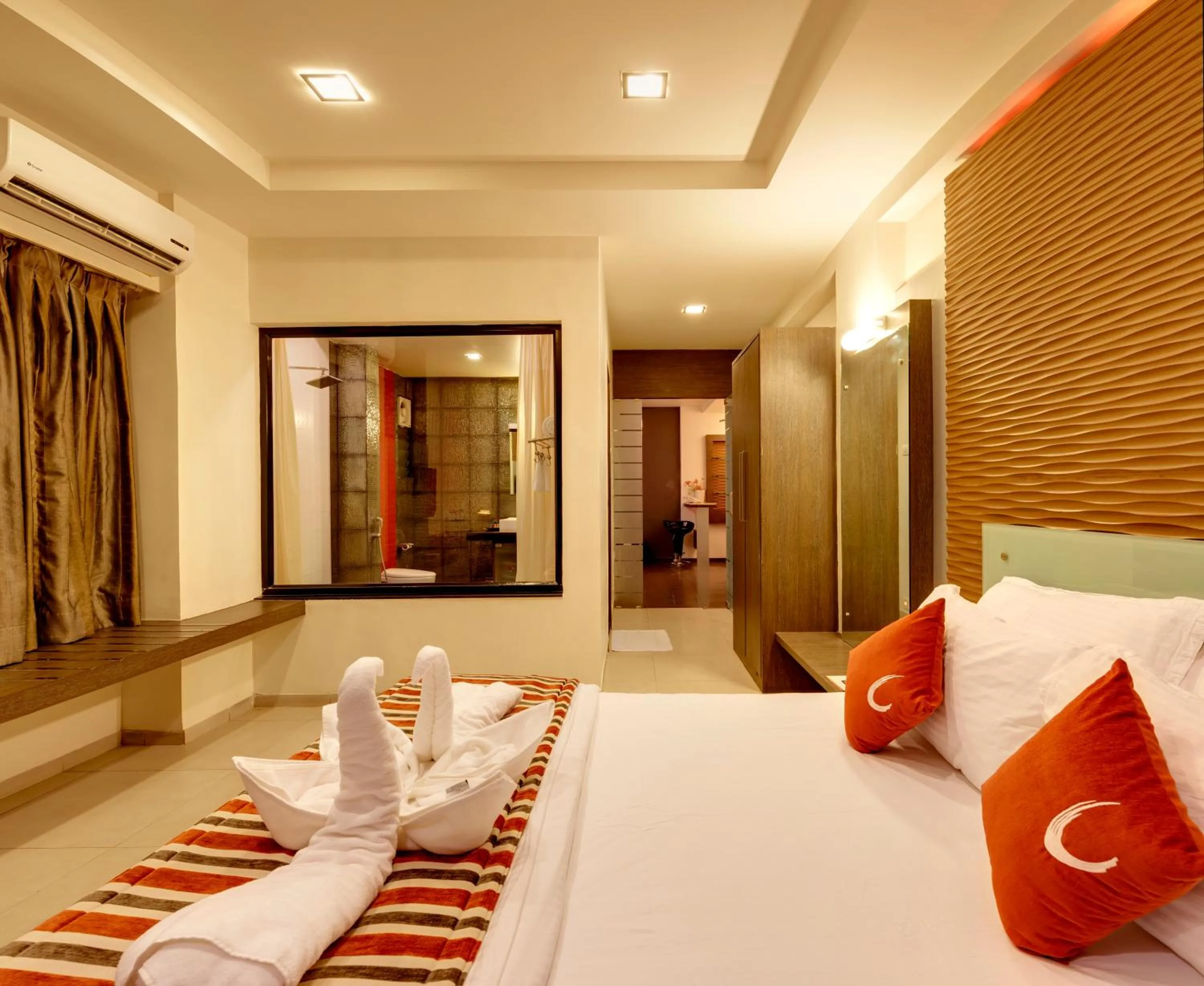 Bedroom, Bed in Regenta Place Raysons Kolhapur