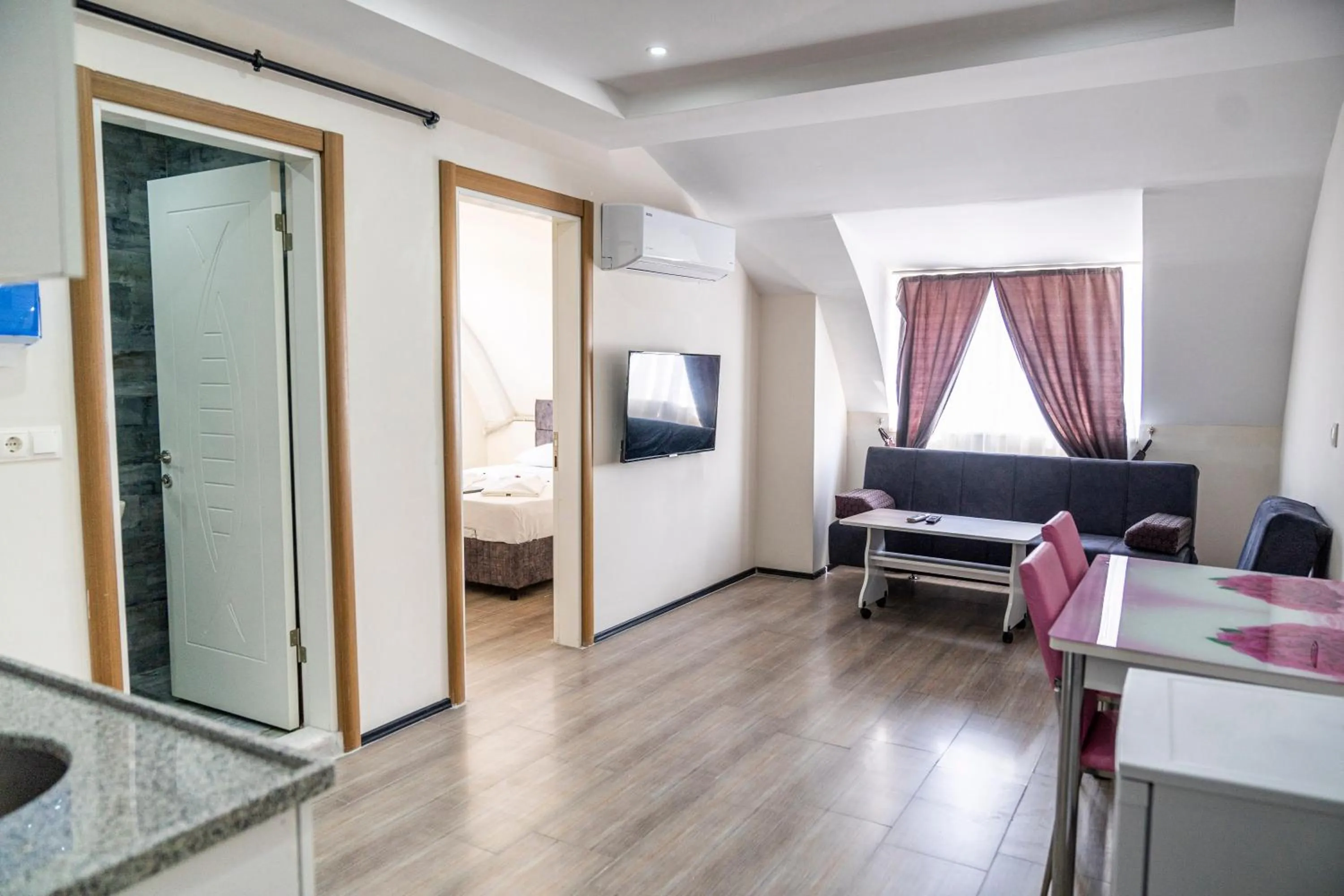 Seating area, Bed in AYYA SUİT HOTEL