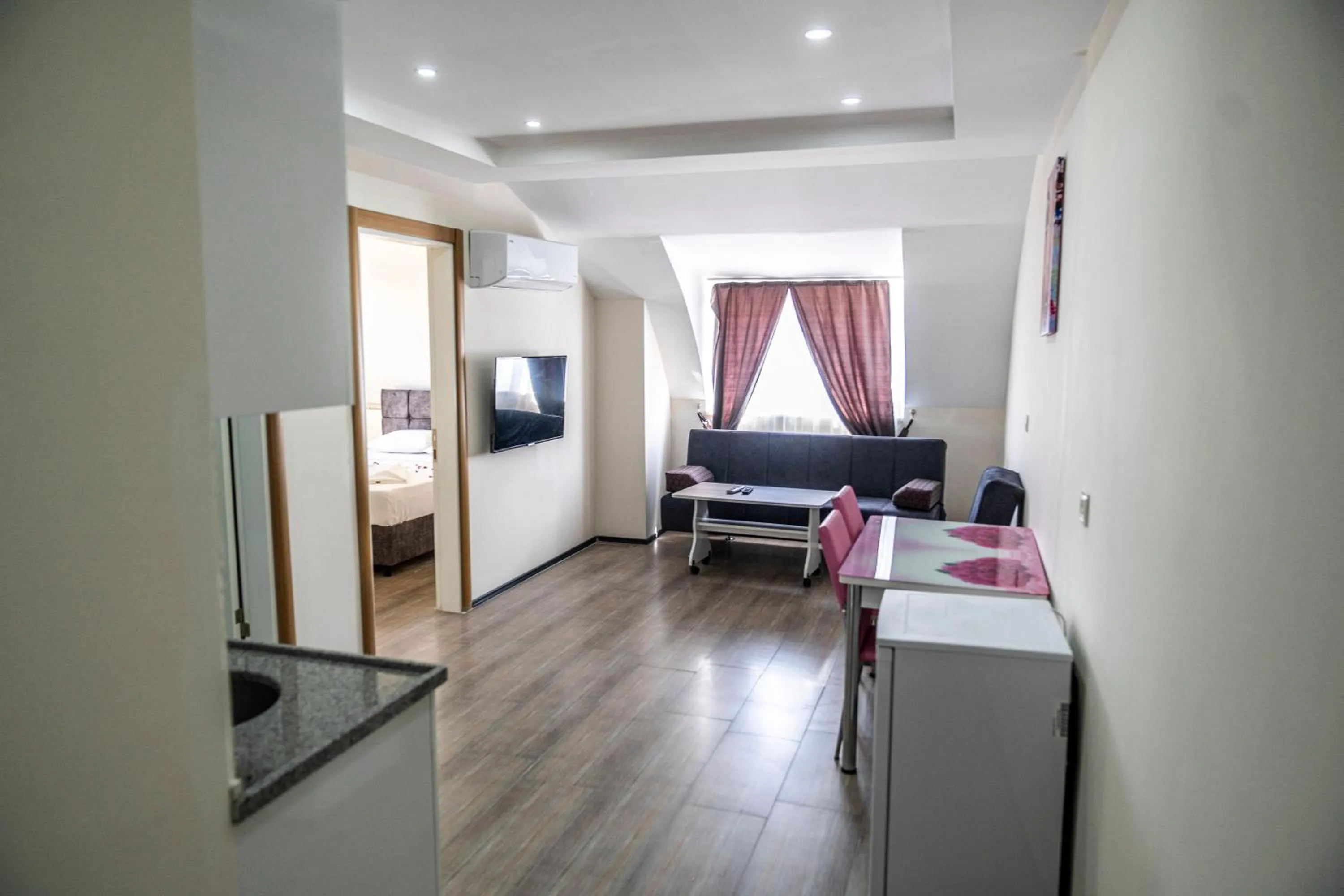 Living room, Bed in AYYA SUİT HOTEL