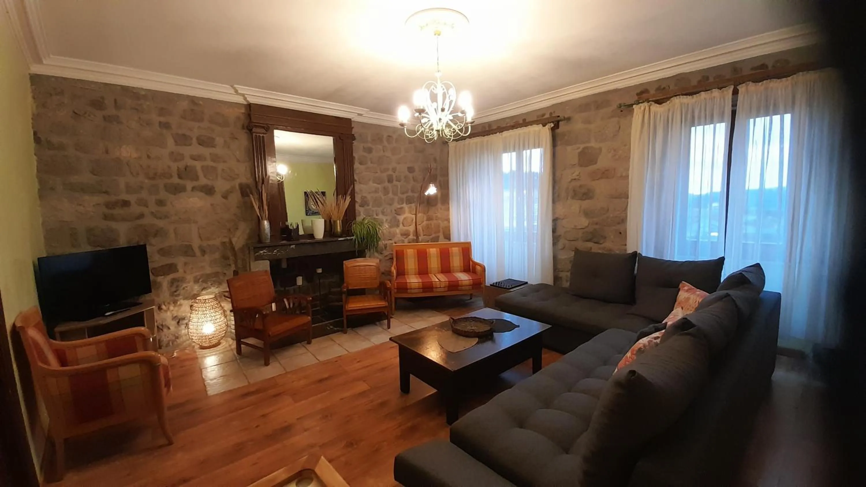 Communal lounge/ TV room in Les Chambres d'Hôtes Le Triskèle