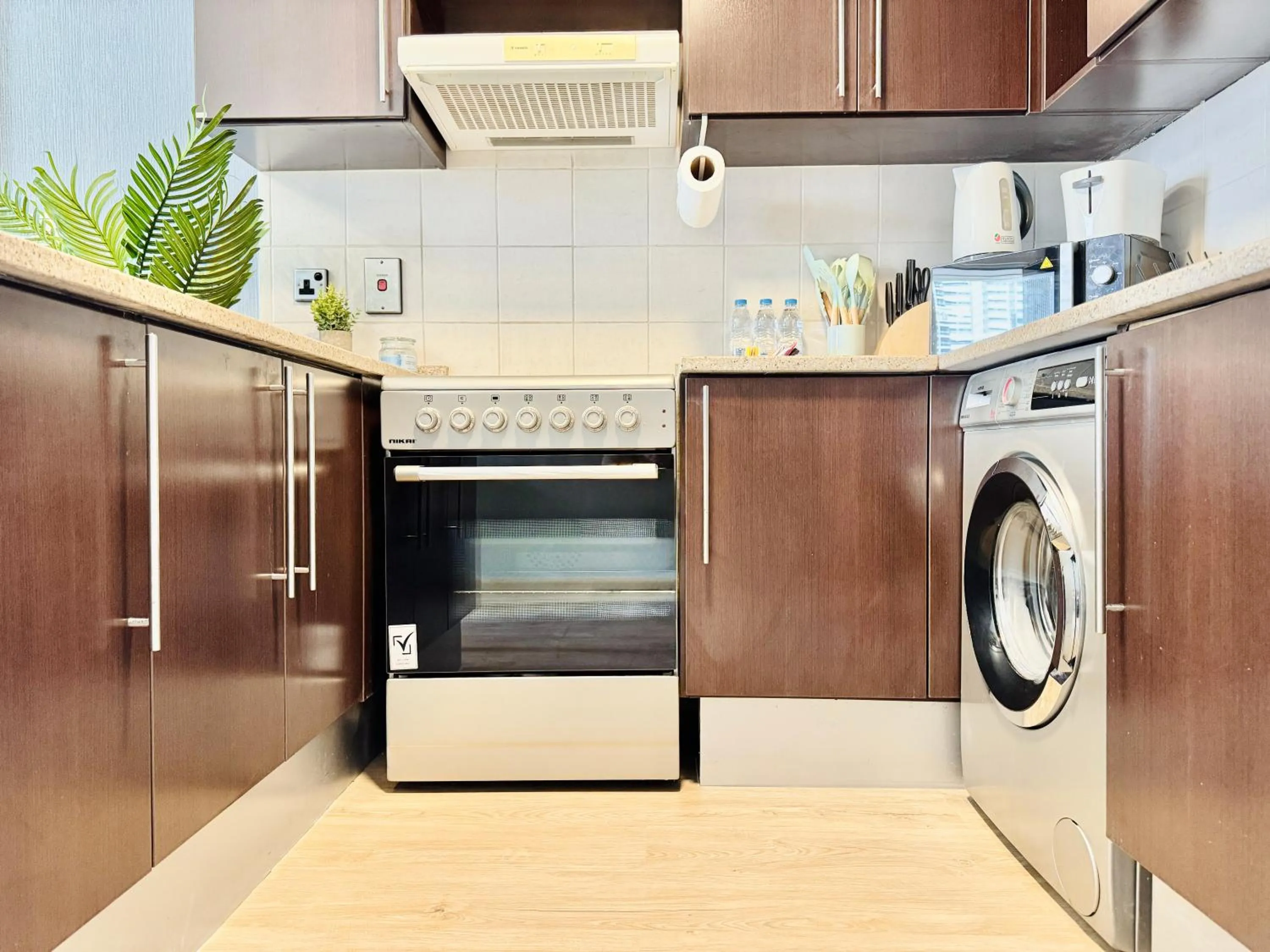 Kitchen or kitchenette in Cosmos Living Dubai Arch Tower Pool, Gym & Balcony