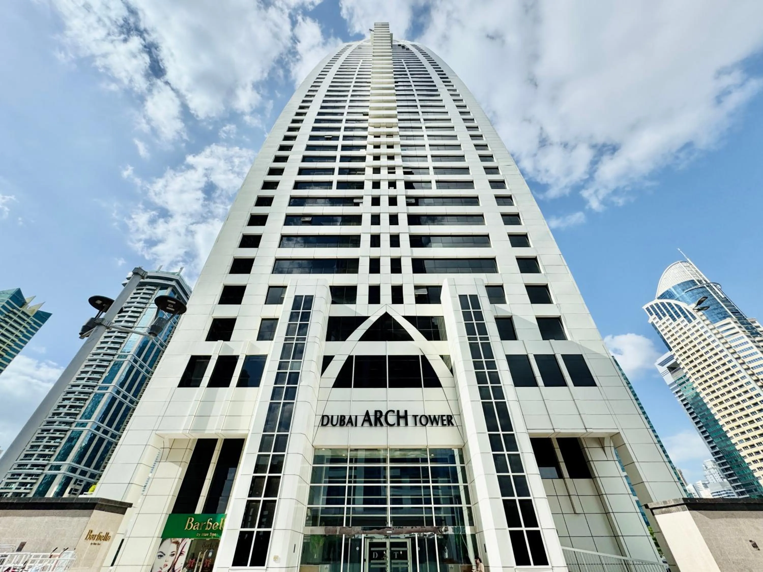 Property building in Cosmos Living Dubai Arch Tower Pool, Gym & Balcony