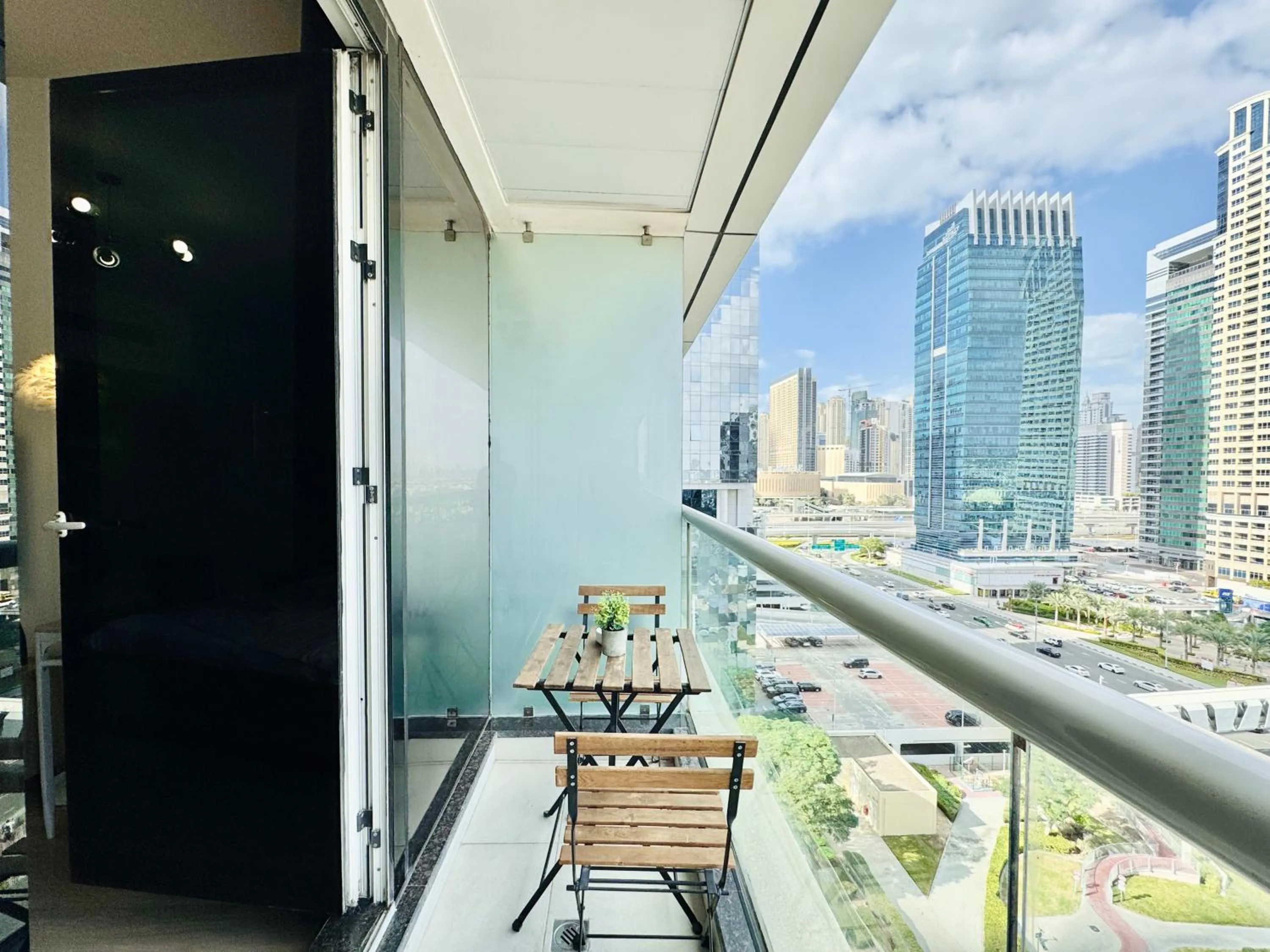 Day in Cosmos Living Dubai Arch Tower Pool, Gym & Balcony