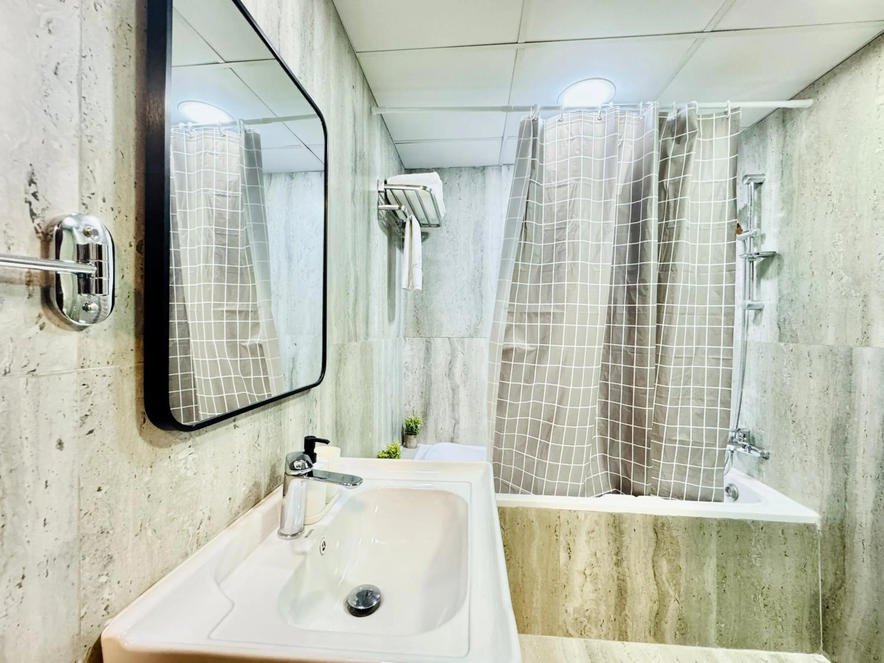 Shower in Cosmos Living Dubai Arch Tower Pool, Gym & Balcony