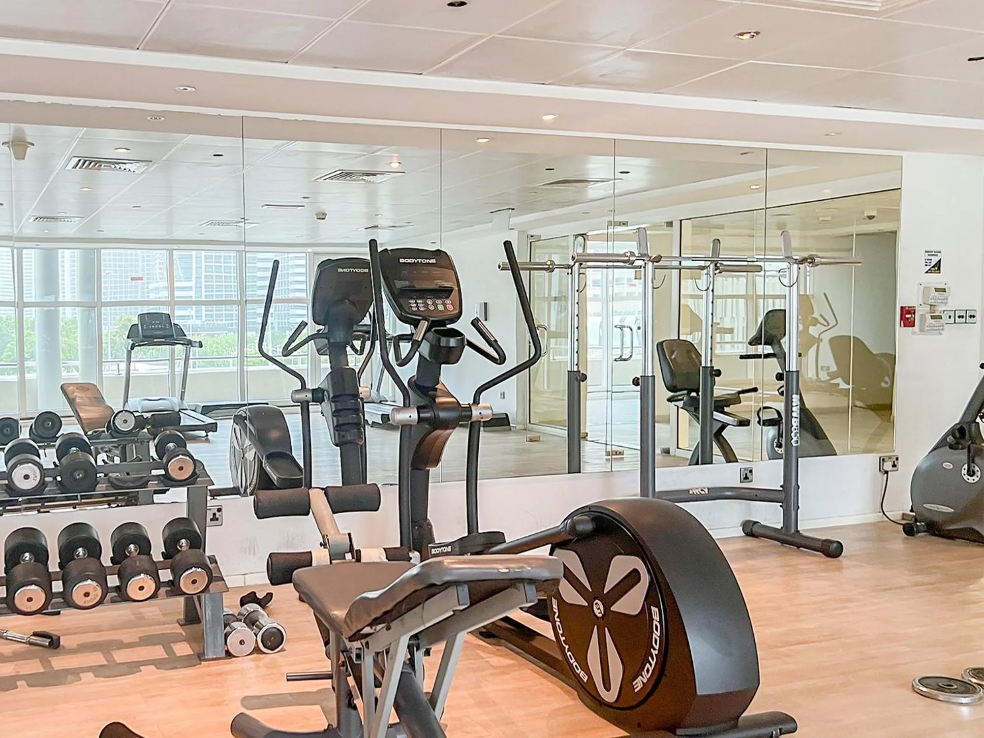 Fitness centre/facilities in Cosmos Living Dubai Arch Tower Pool, Gym & Balcony