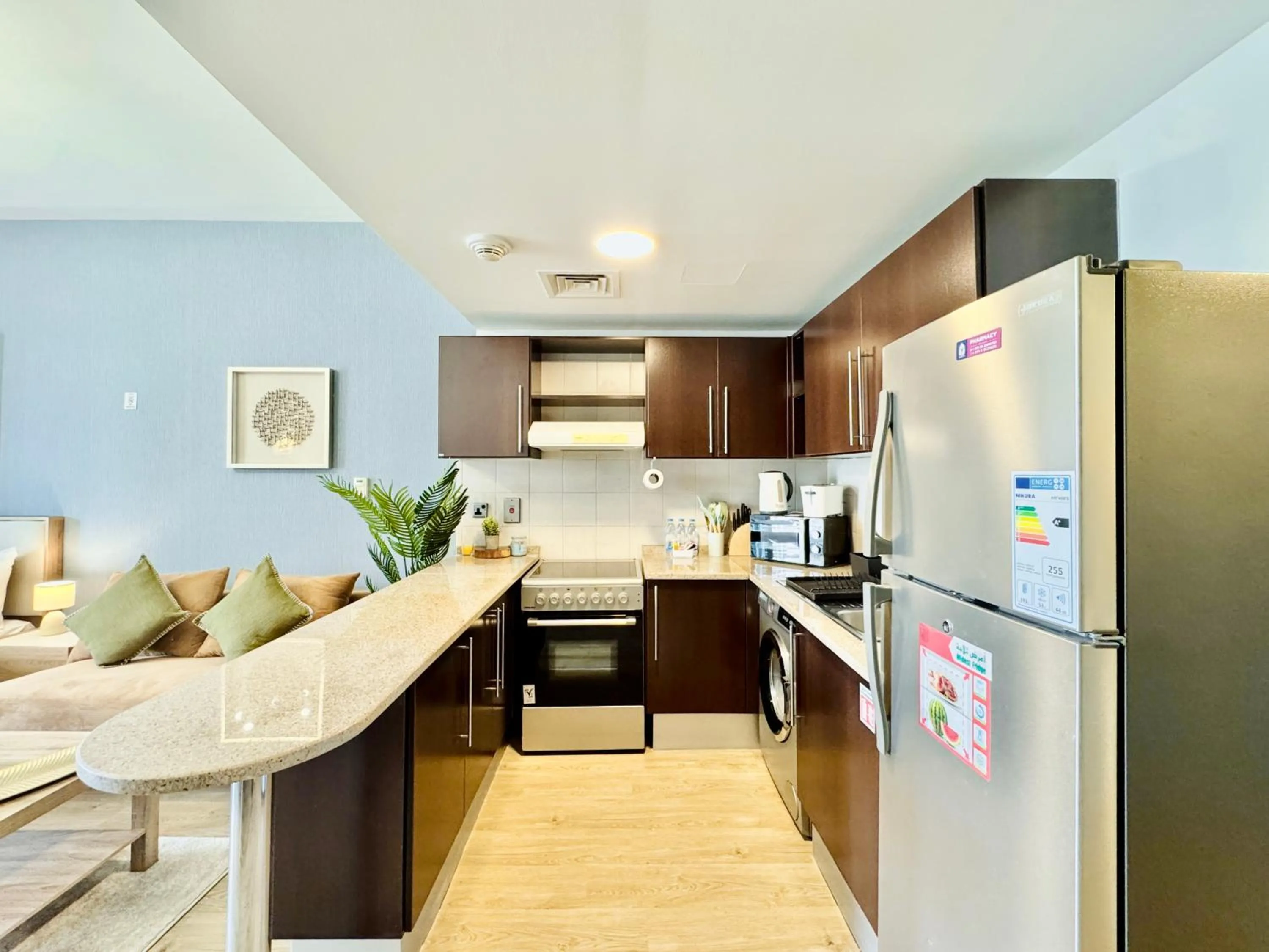 Kitchen or kitchenette in Cosmos Living Dubai Arch Tower Pool, Gym & Balcony