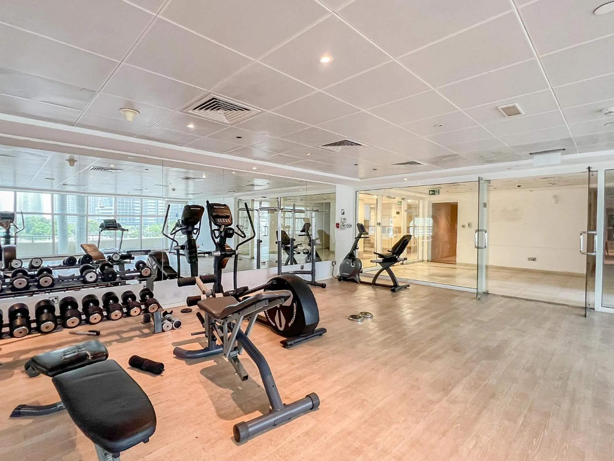 Fitness centre/facilities in Cosmos Living Dubai Arch Tower Pool, Gym & Balcony