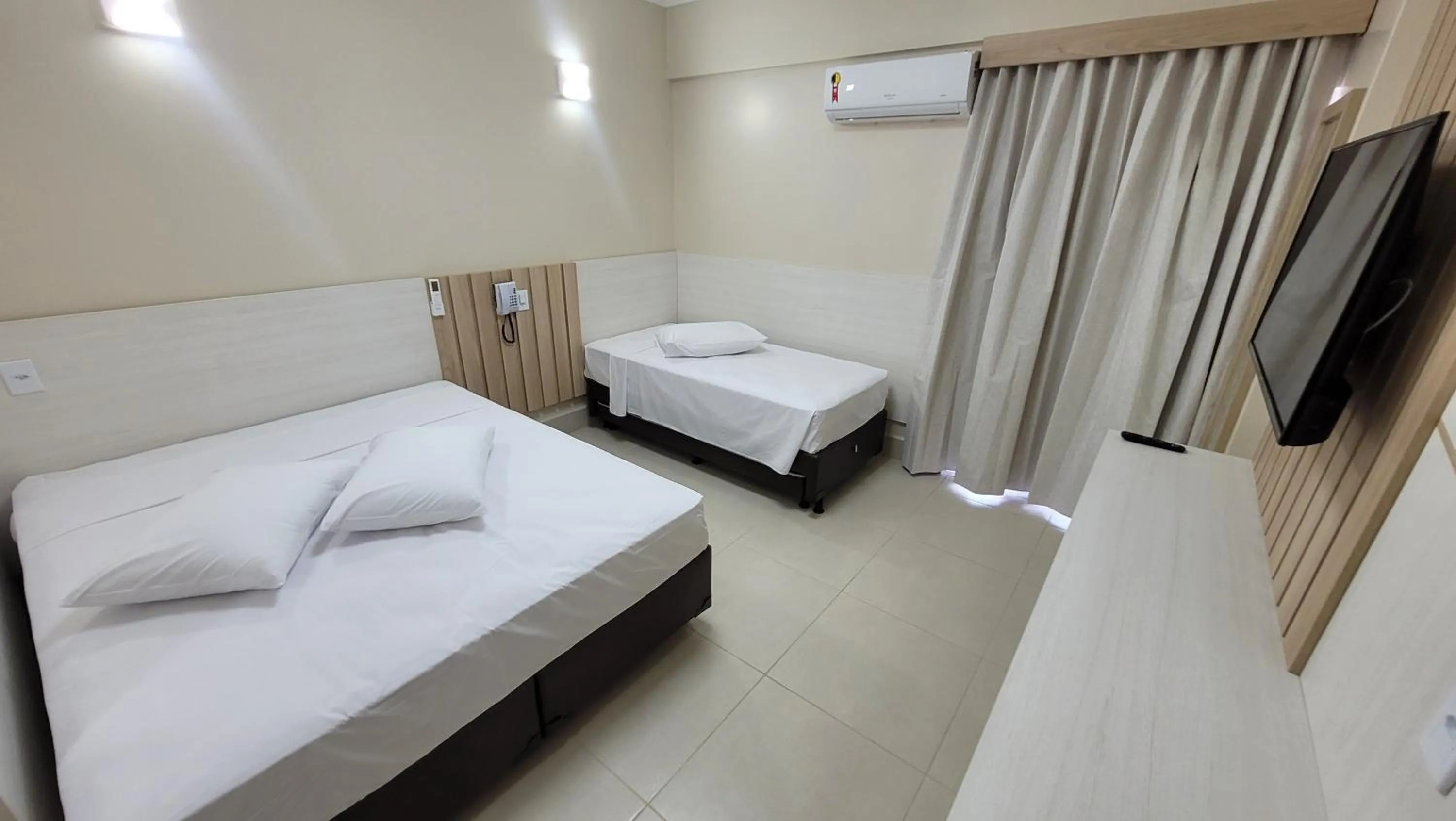 Bed in Spazzio Diroma Hospedagem com acesso gratuito no Acqua Park