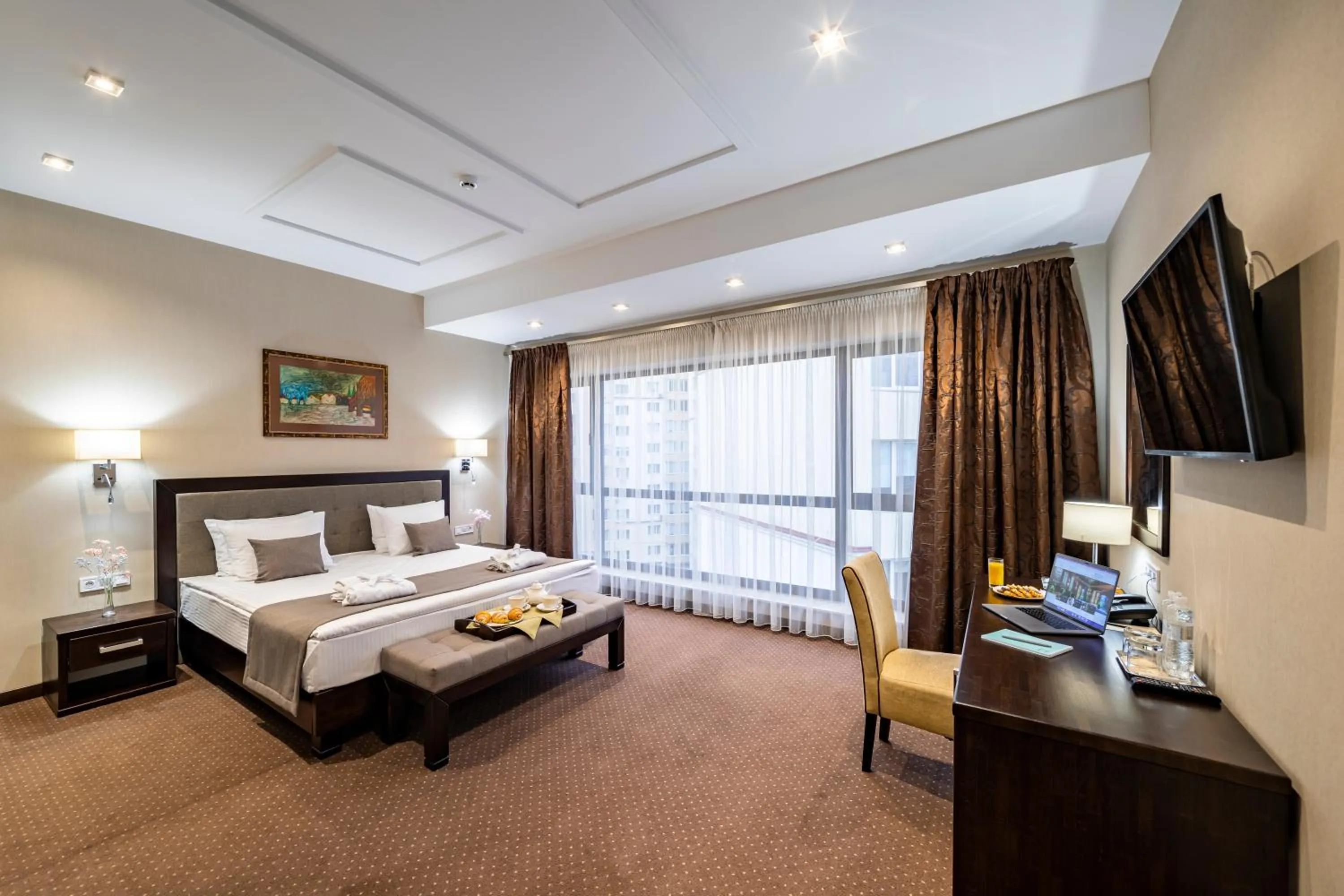 Bed in Taurus Hotel & SPA