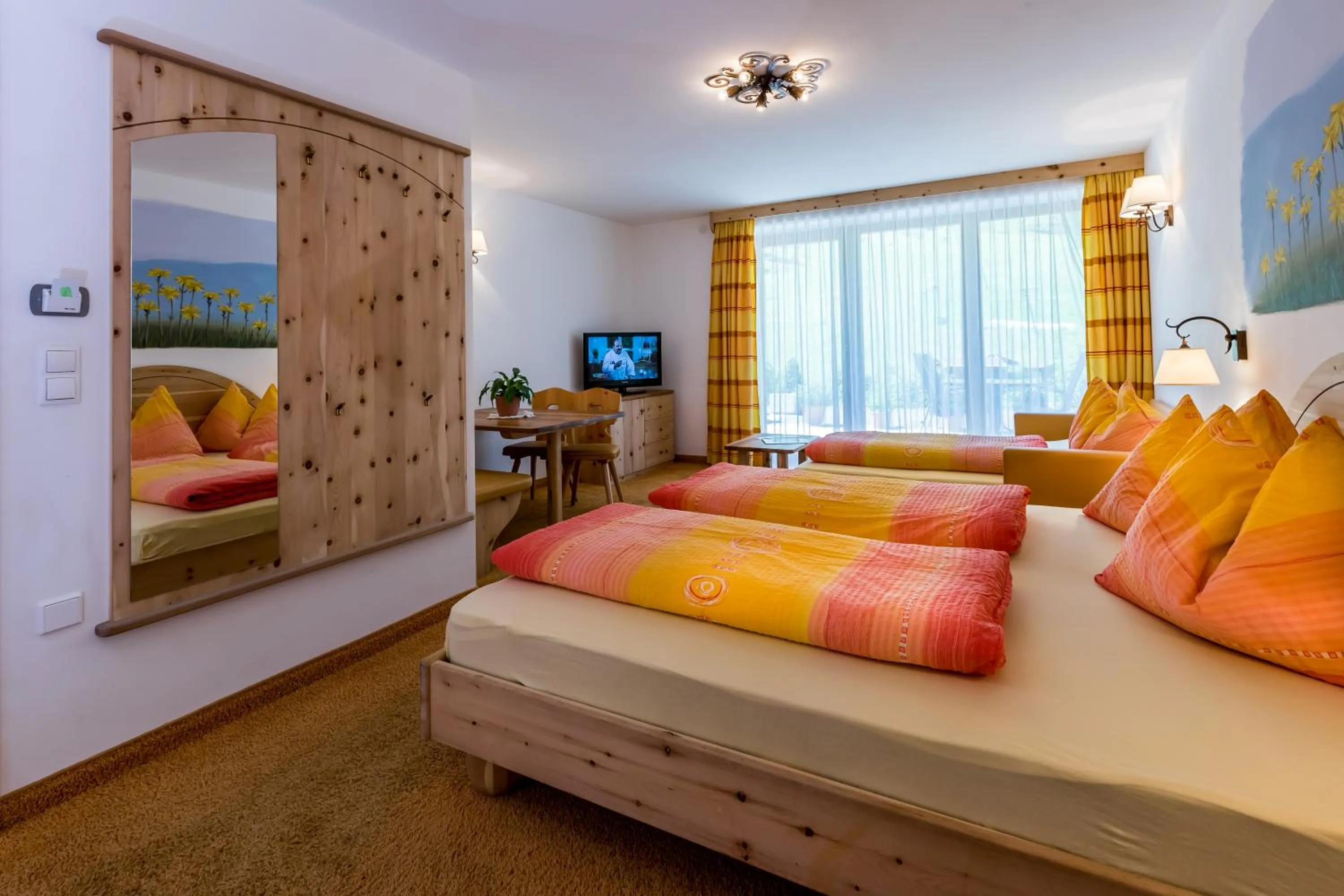 Seating area, Bed in Hotel Restaurant Rosmarie