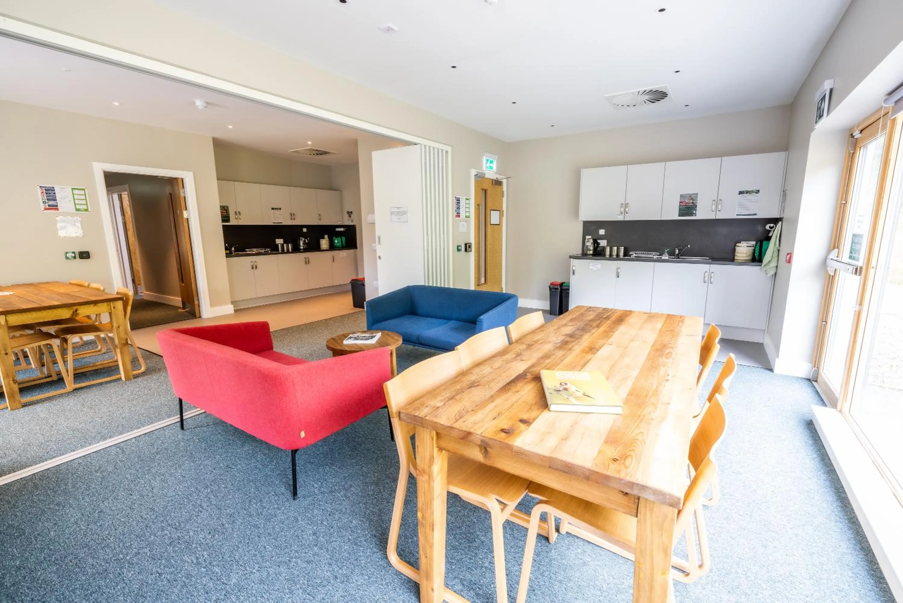 Communal lounge/ TV room in An Spiris Accommodation at Dundreggan Rewilding Centre
