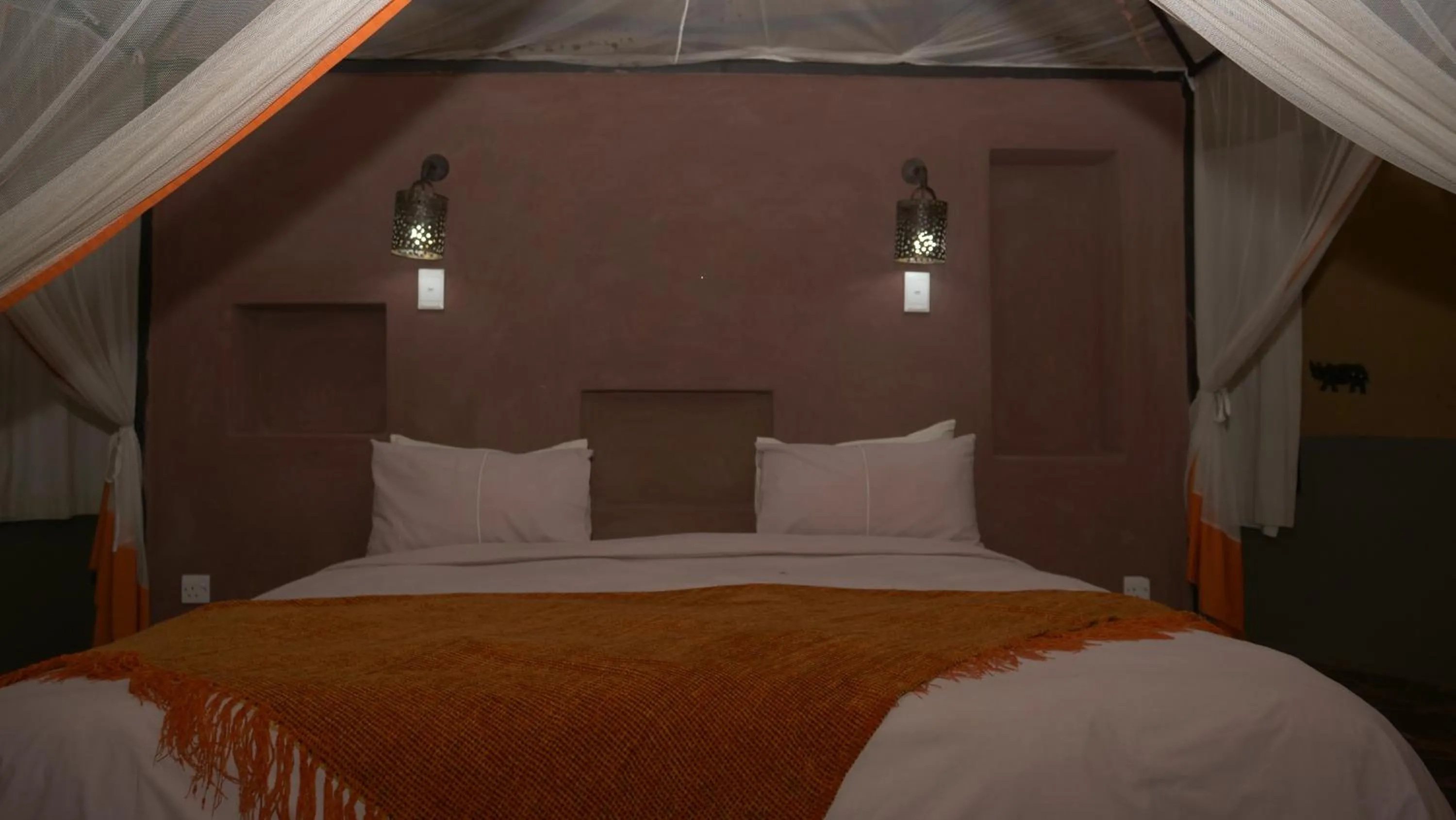 Bed in Munga Eco-Lodge