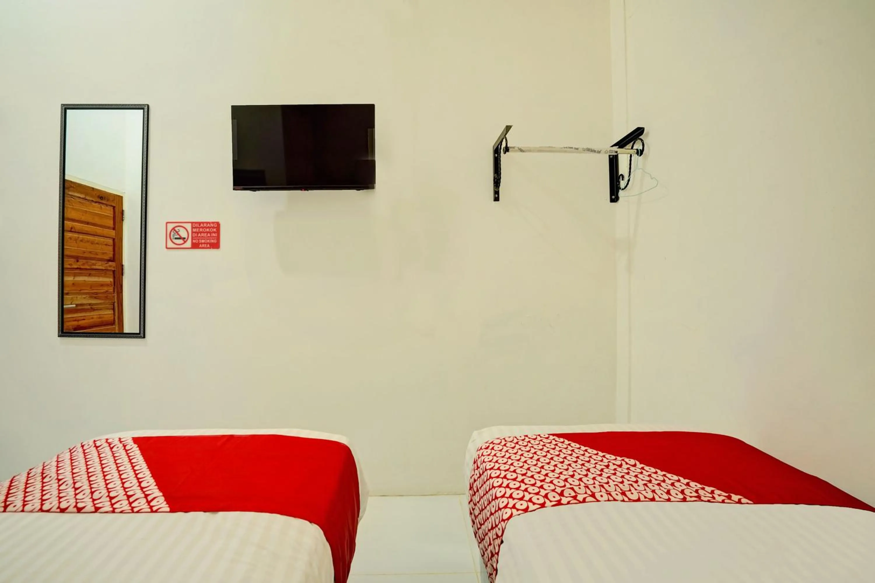 Bedroom in OYO 92700 D' Ngalau Residence Syariah