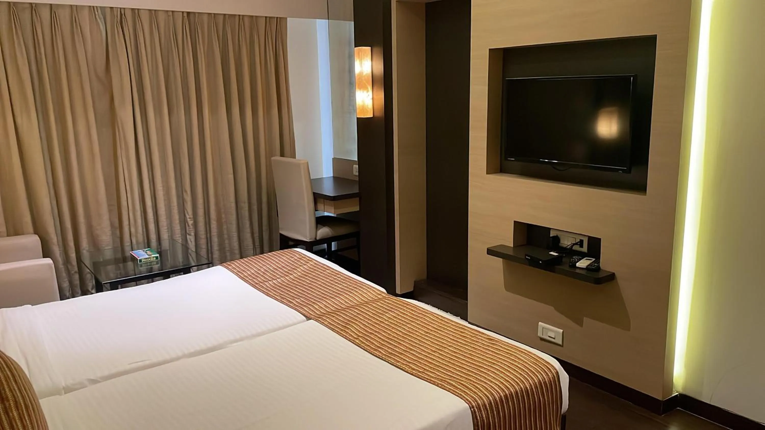 Bed in Galaxy Beacon Hotel, Santacruz ,Mumbai