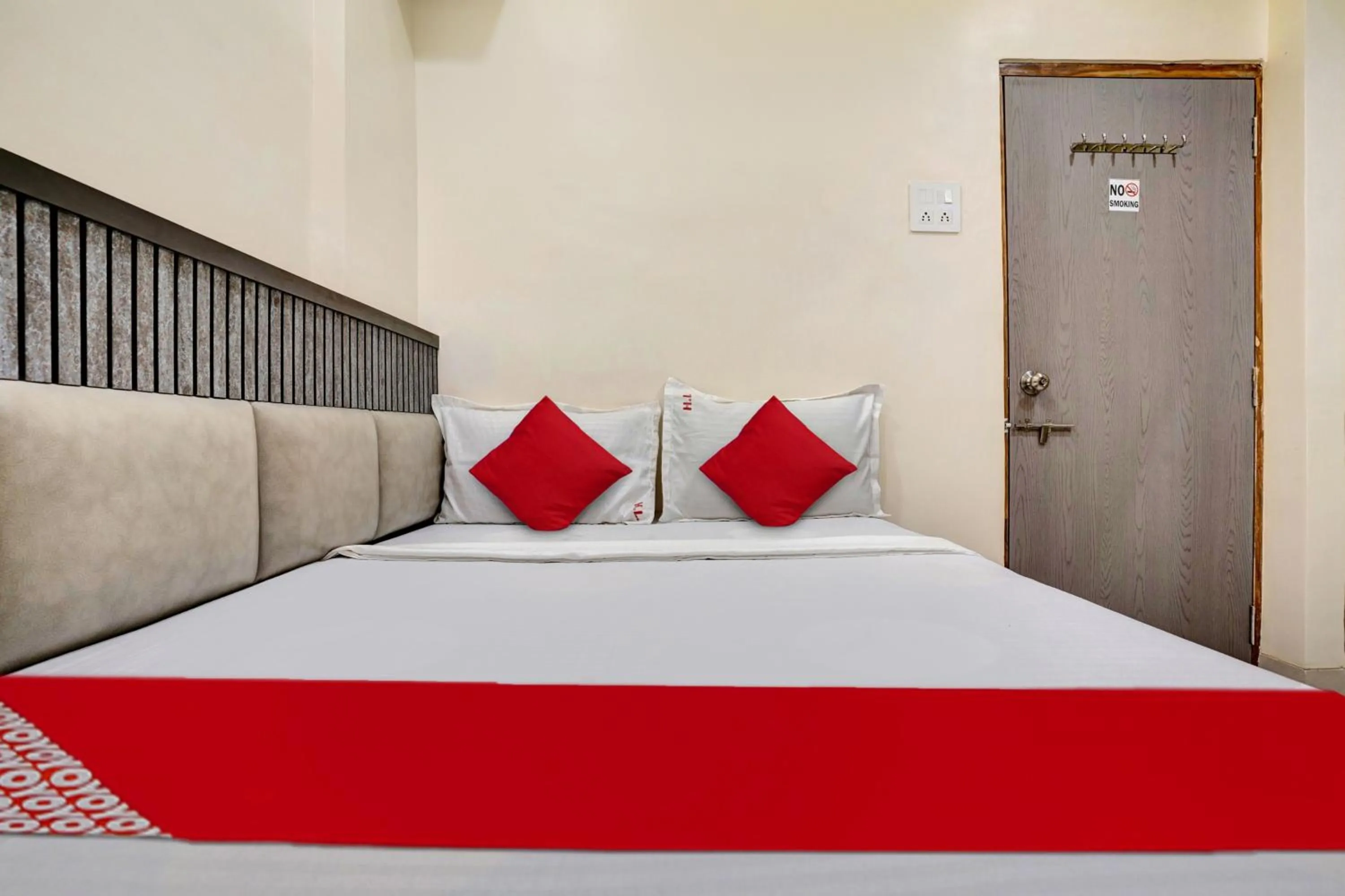 Bedroom in Hotel O Dhiman Residency