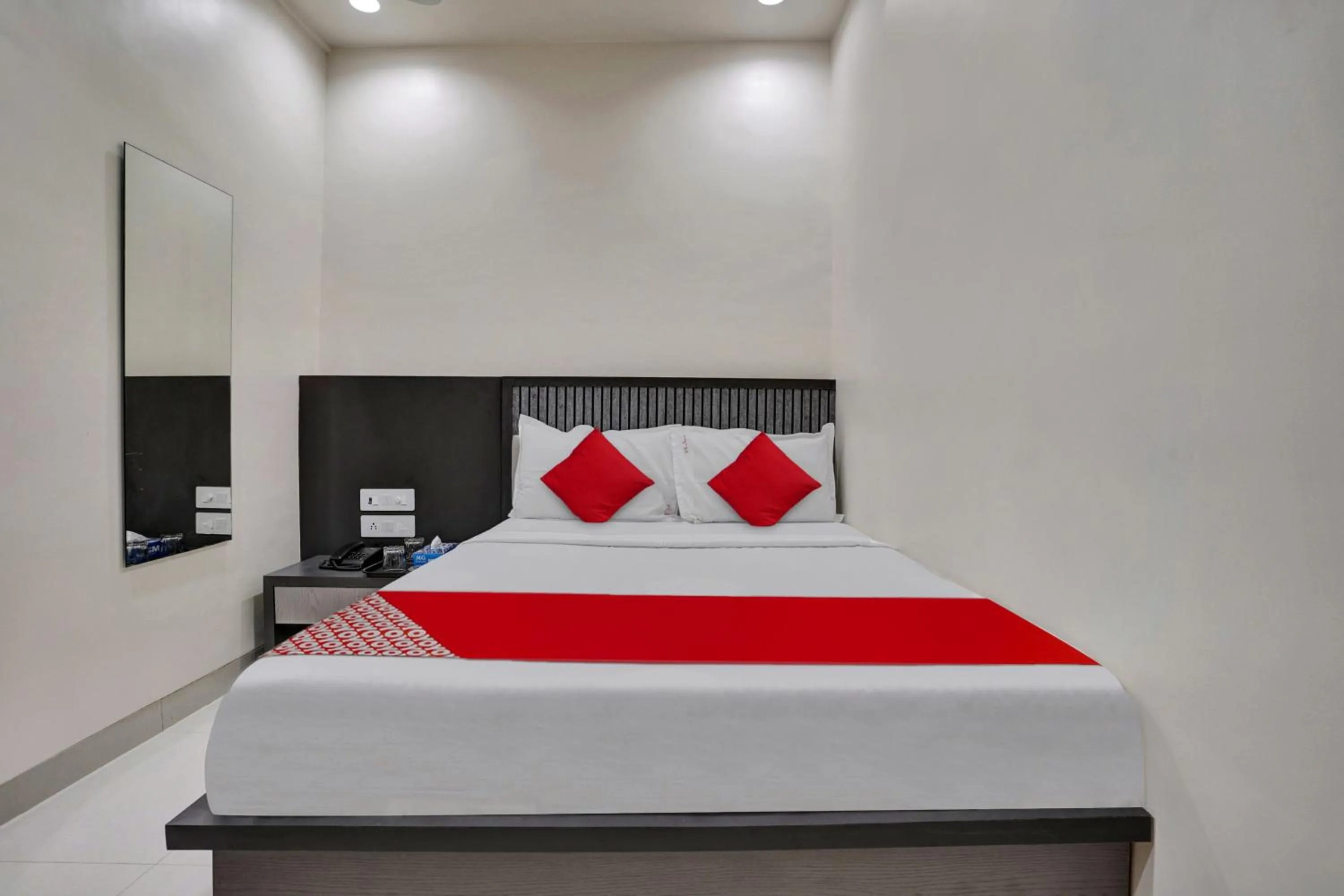 Bedroom in Hotel O Dhiman Residency