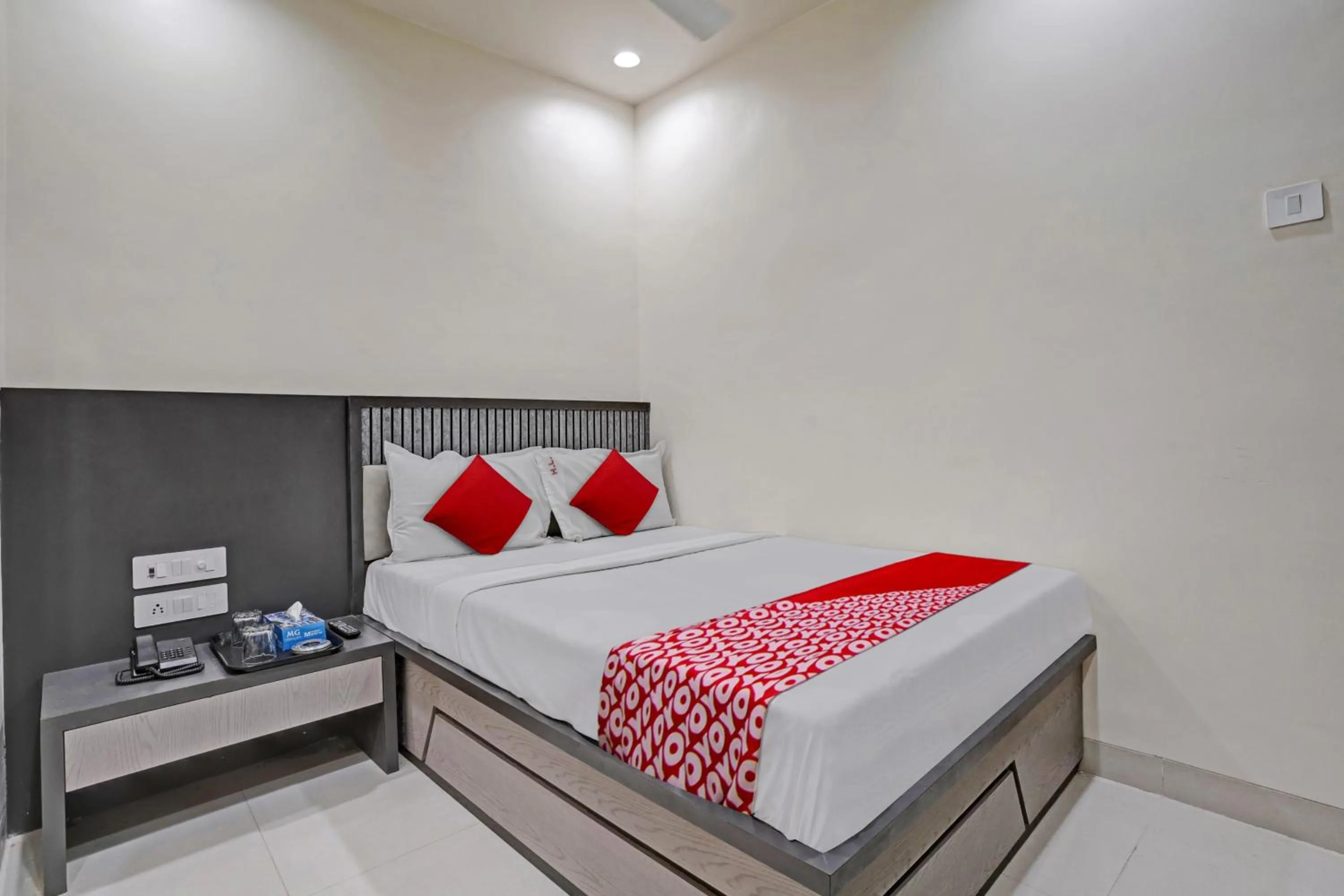Bedroom in Hotel O Dhiman Residency