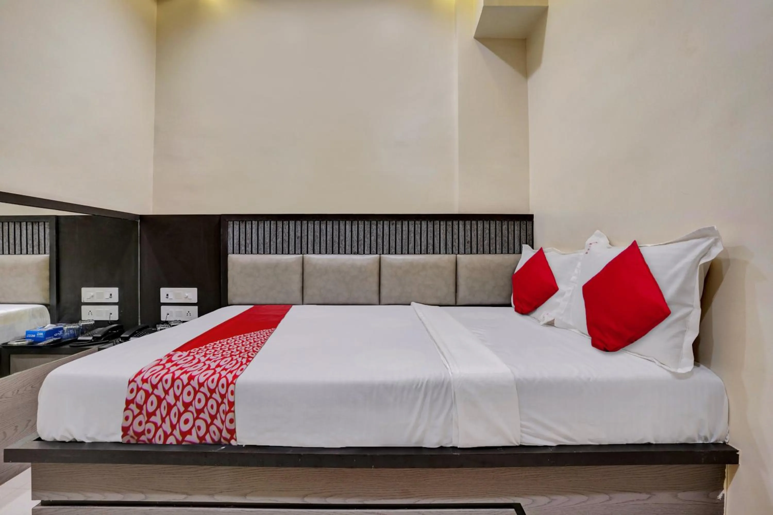Bedroom in Hotel O Dhiman Residency