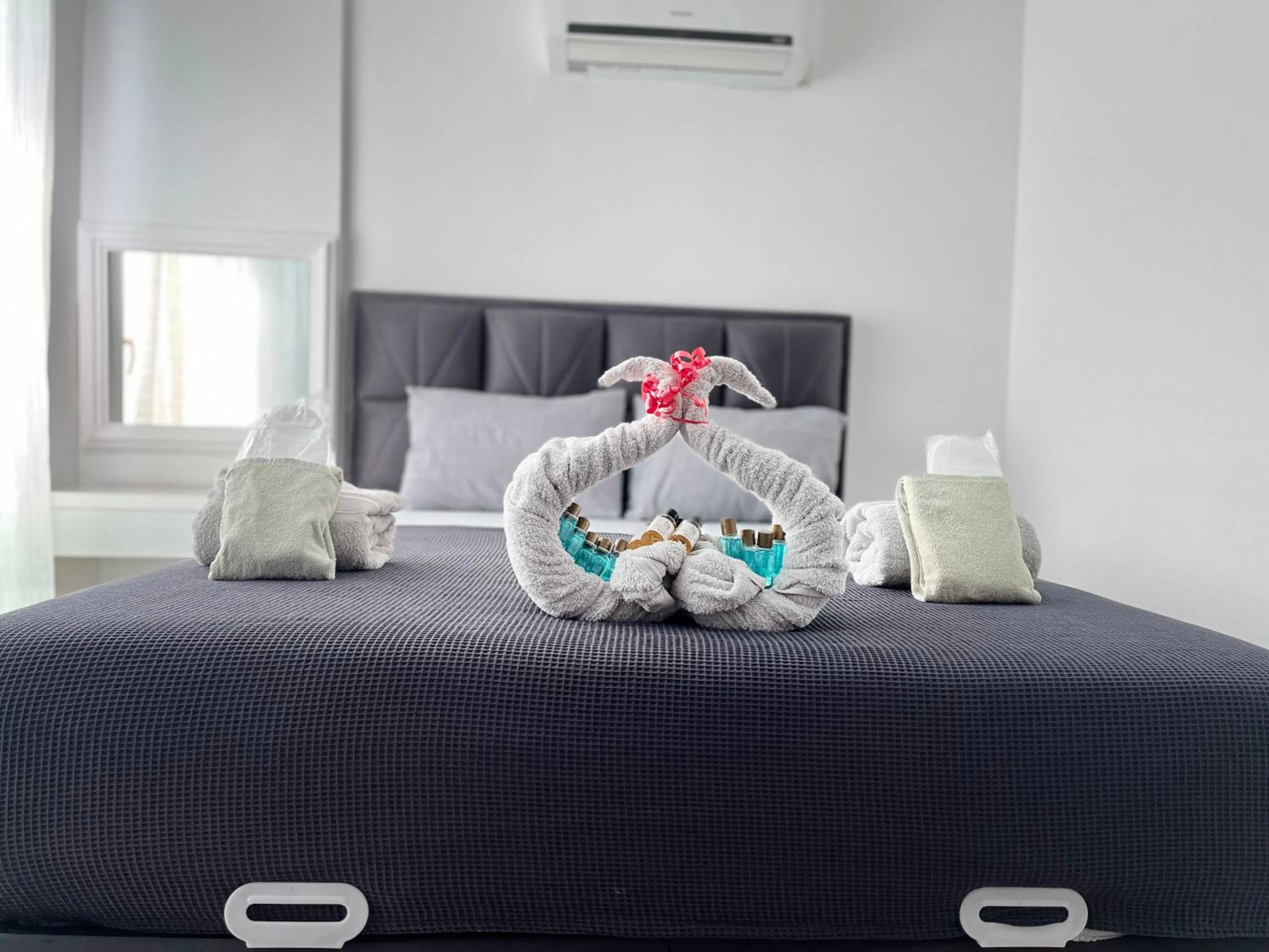 Bed in Gardenya Lara Suit Hotel